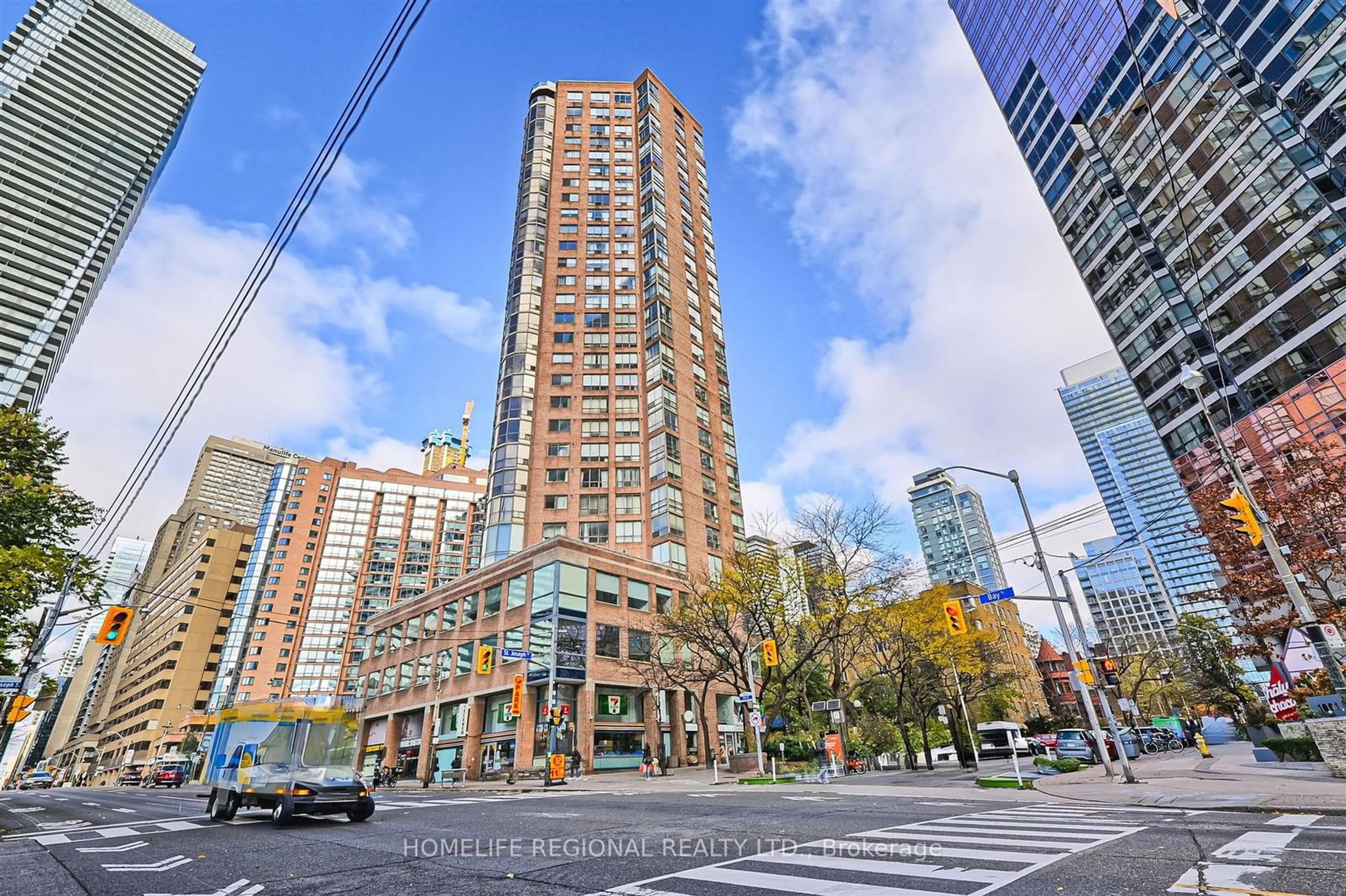 A pic from exterior of the house or condo, the street view for 44 St Joseph St #617, Toronto Ontario M4Y 2W4