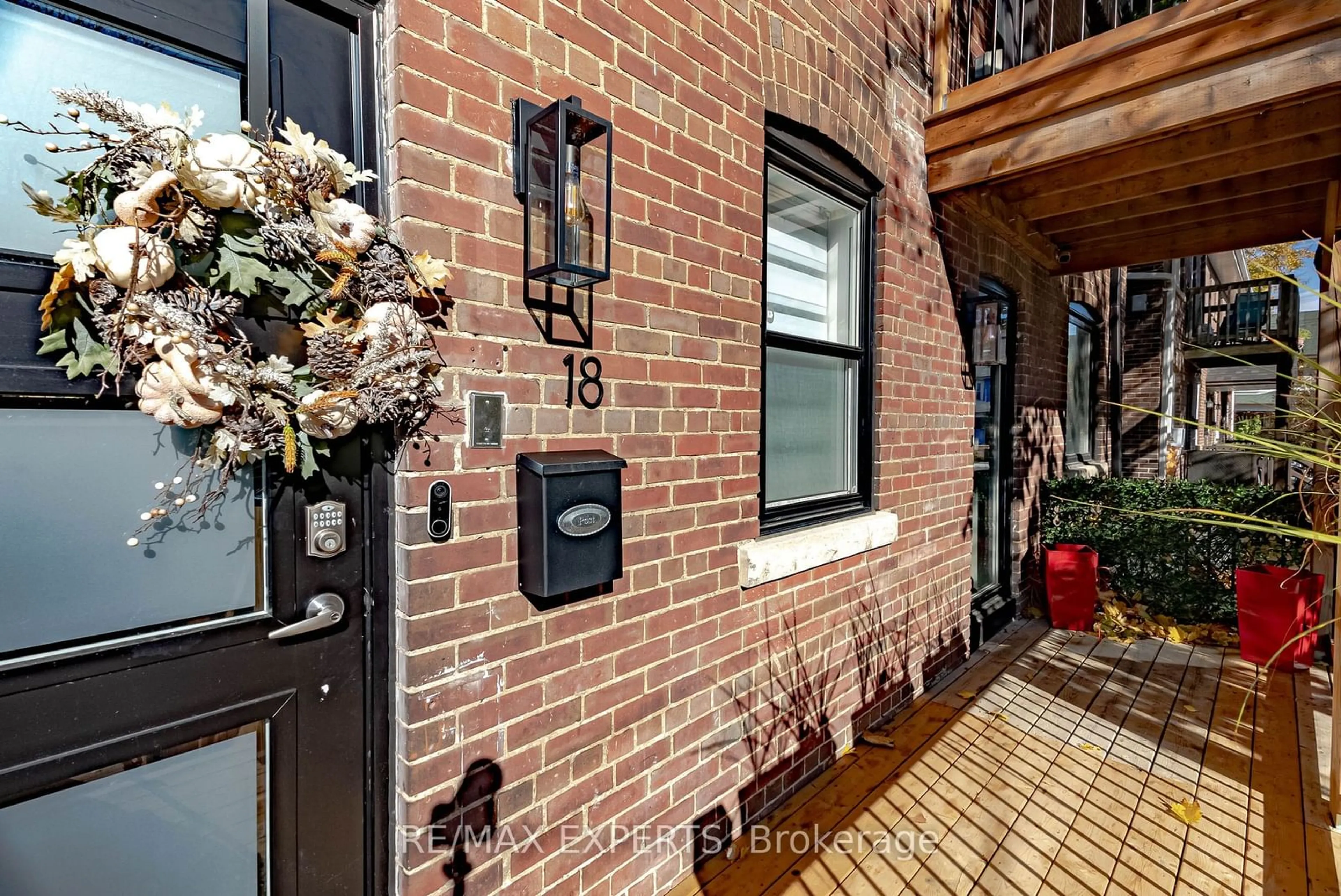 Home with brick exterior material for 16-18 Page St, Toronto Ontario M6G 1J2