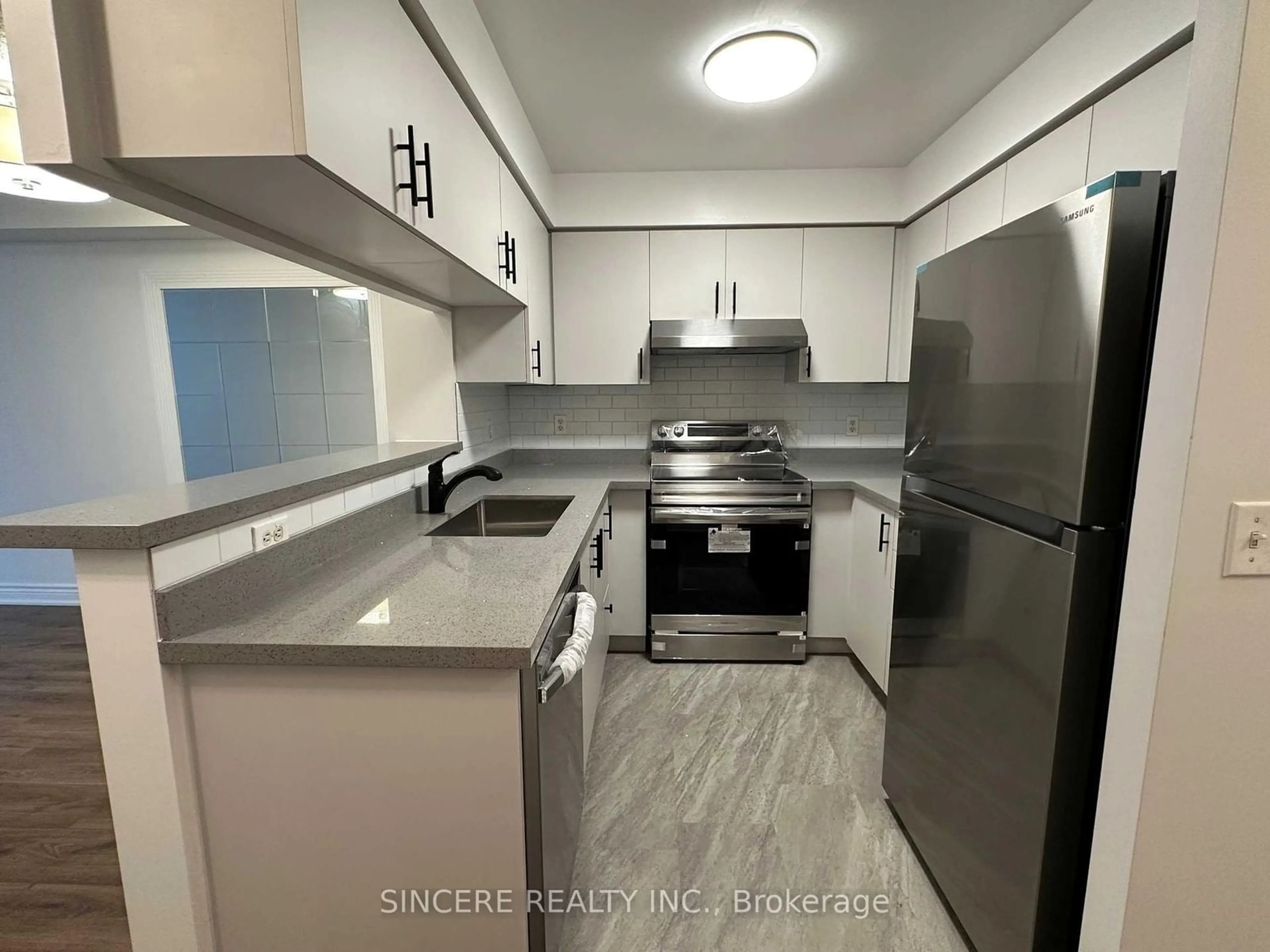 Standard kitchen, wood floors for 28 Olive Ave #303, Toronto Ontario M2N 7E6