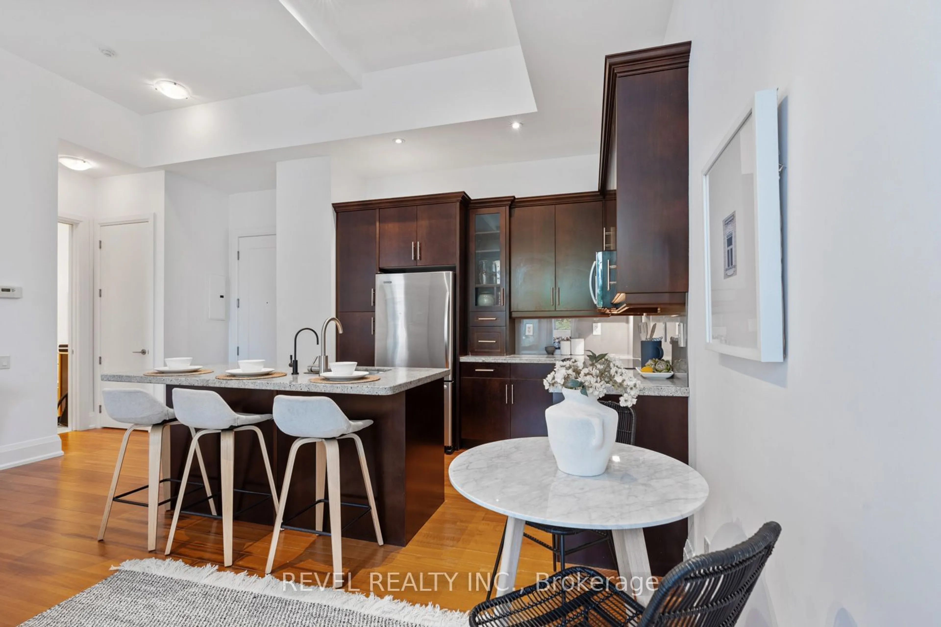 Open concept kitchen for 385 Brunswick Ave #205, Toronto Ontario M5R 3R1