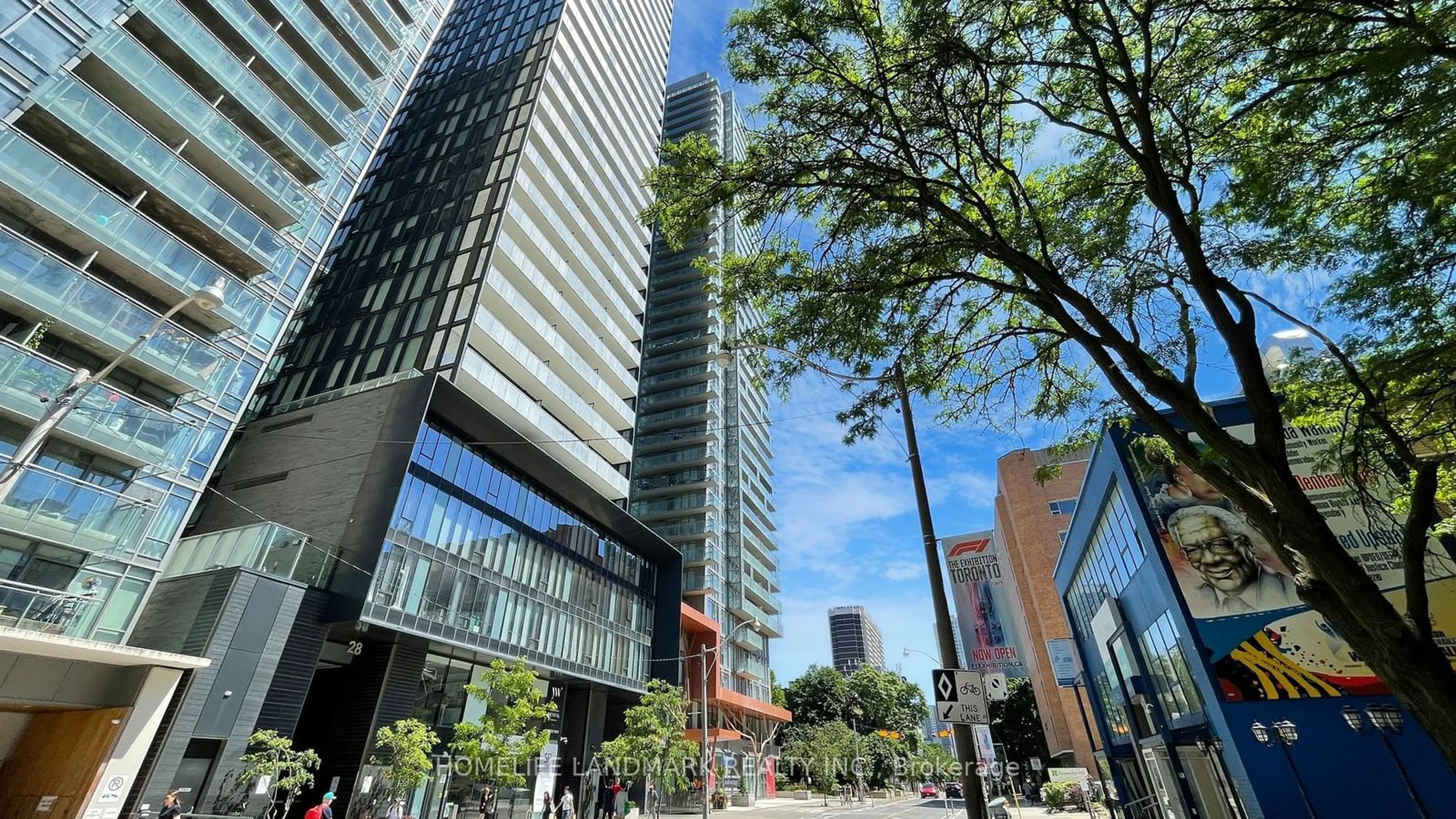 A pic from exterior of the house or condo, the view of city buildings for 28 Wellesley St #403, Toronto Ontario M4Y 0C4