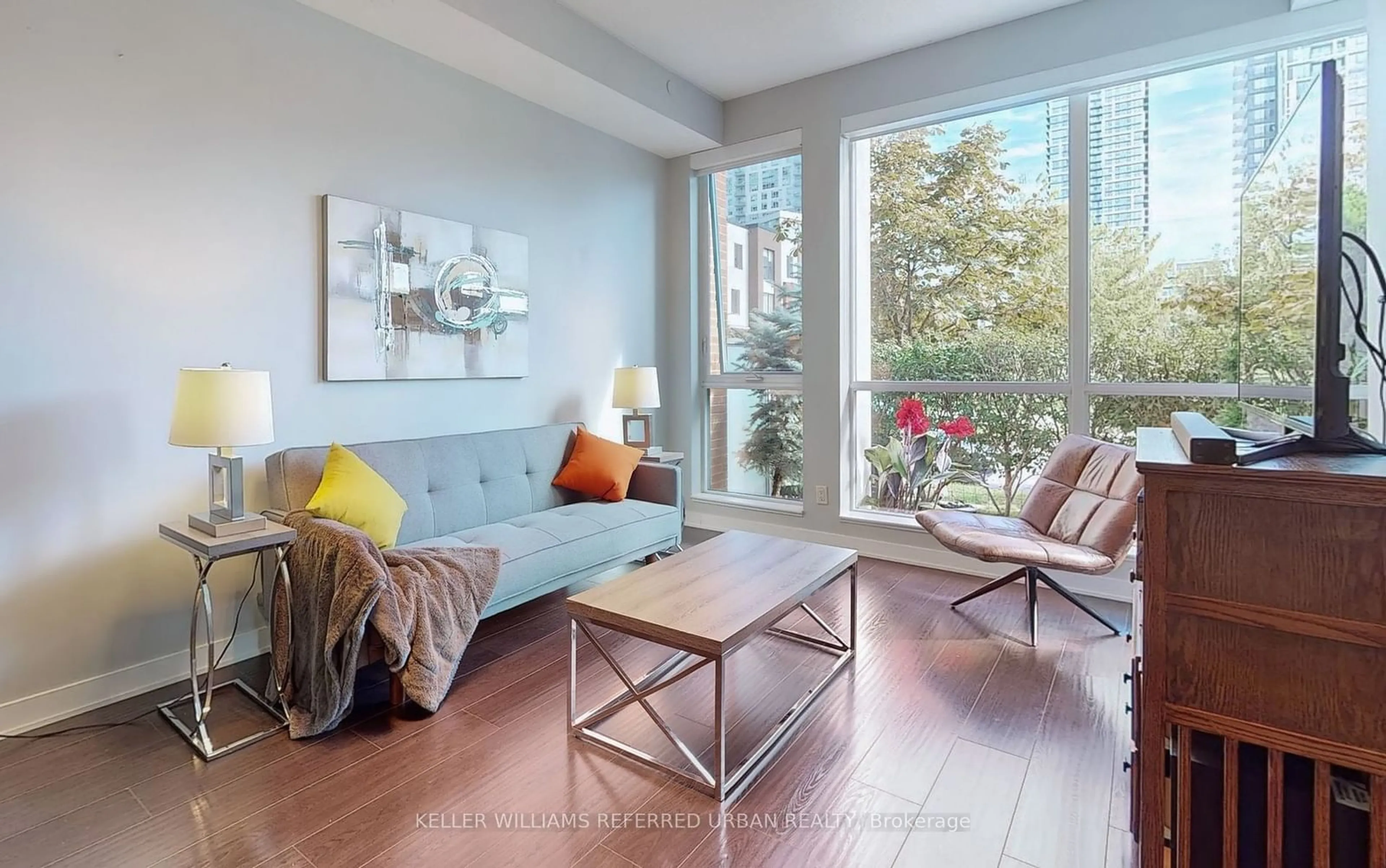 Living room, wood floors for 55 Regent Park Blvd #112, Toronto Ontario M5A 0C2