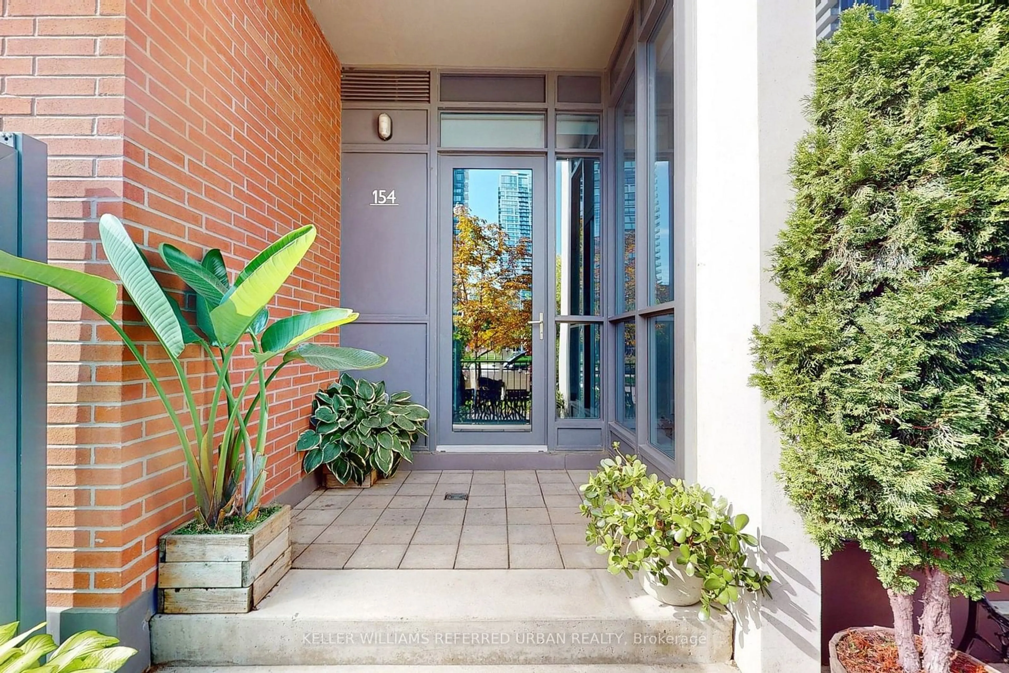 Indoor foyer, cement floor for 55 Regent Park Blvd #112, Toronto Ontario M5A 0C2