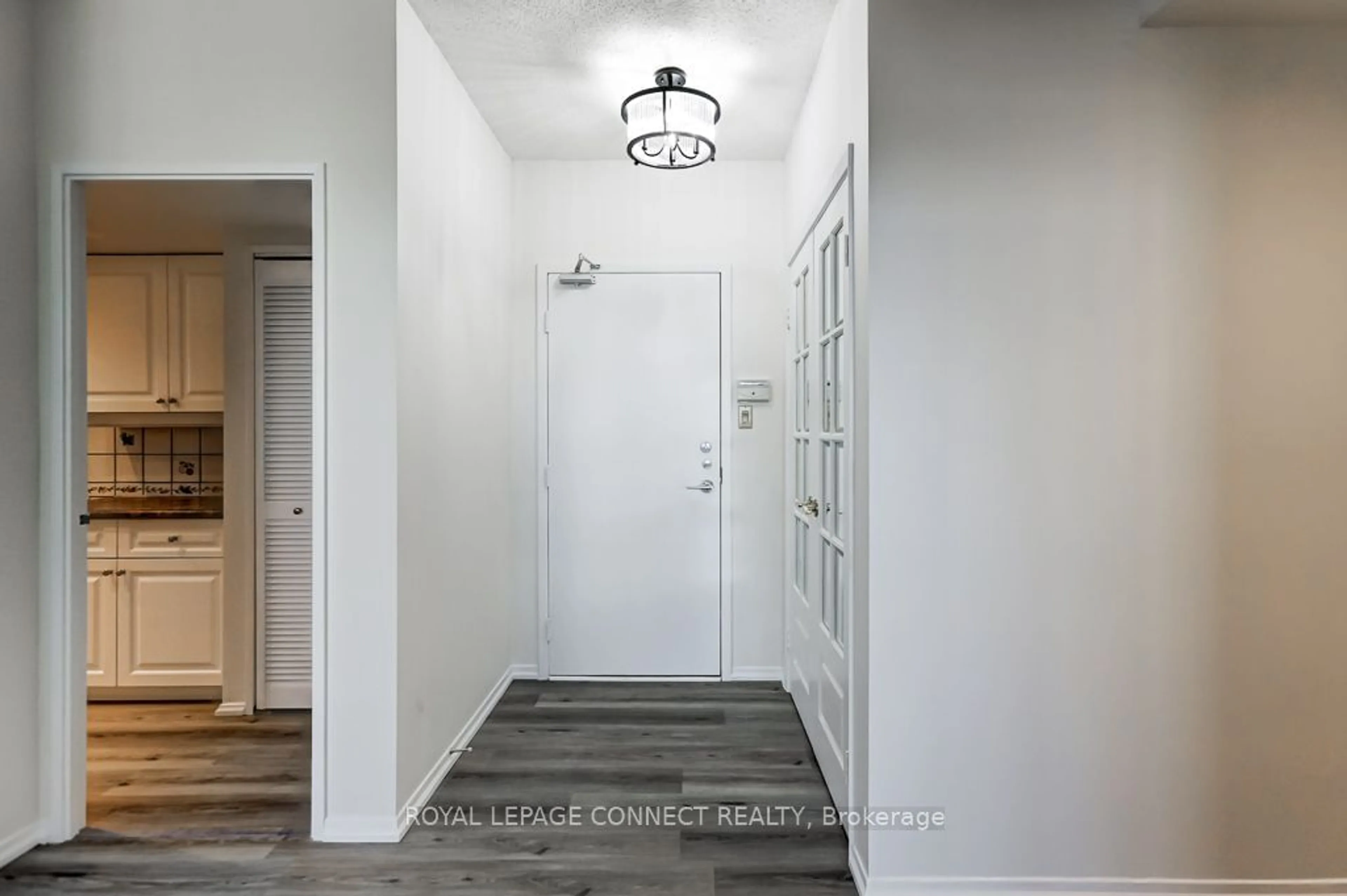 Indoor entryway, wood floors for 75 Wynford Heights Cres #1908, Toronto Ontario M3C 3H9