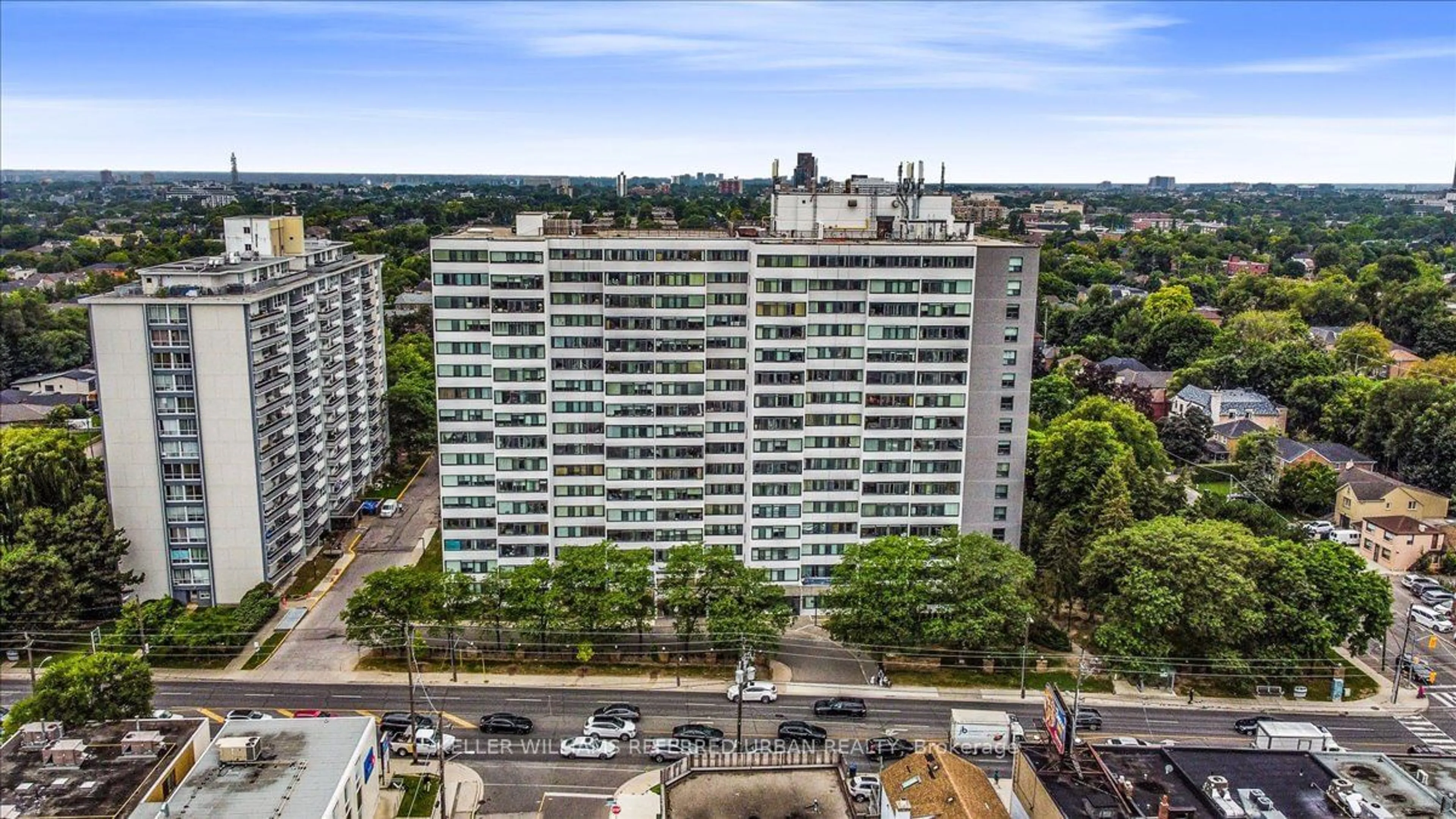 A pic from exterior of the house or condo, the view of city buildings for 3000 Bathurst St #1401, Toronto Ontario M6B 3B4