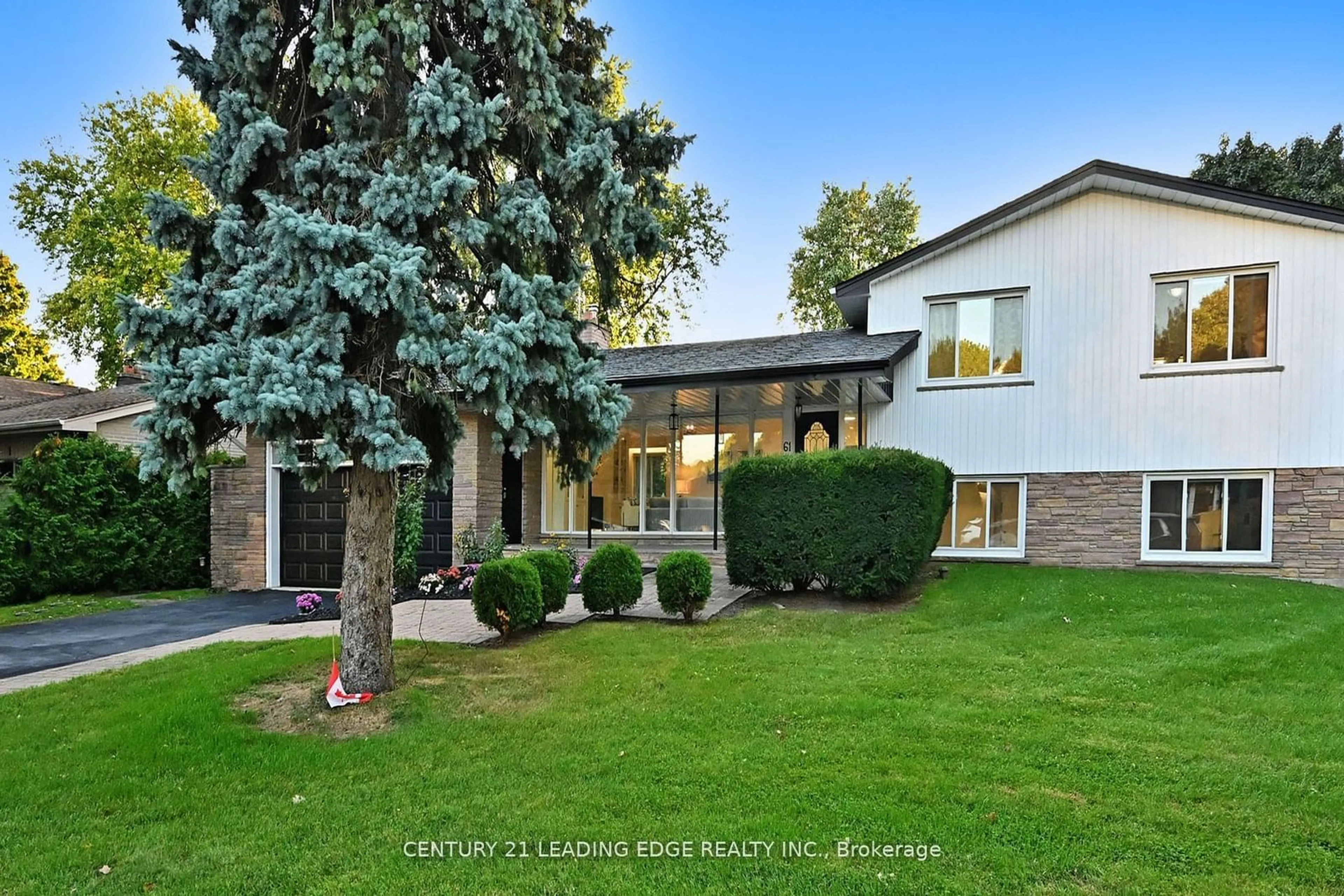 Frontside or backside of a home, the fenced backyard for 61 Laurentide Dr, Toronto Ontario M3A 3E1