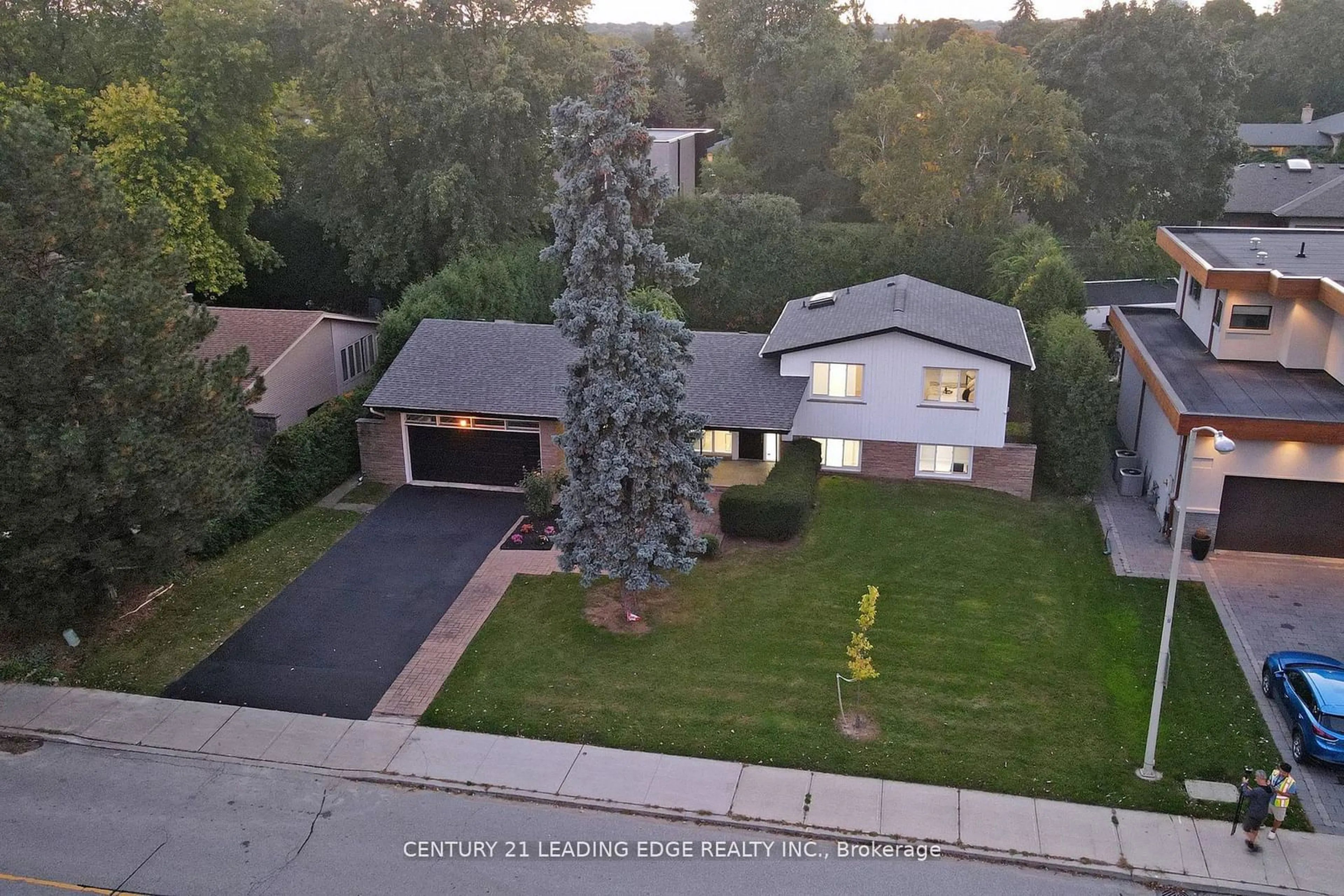 Frontside or backside of a home, the street view for 61 Laurentide Dr, Toronto Ontario M3A 3E1