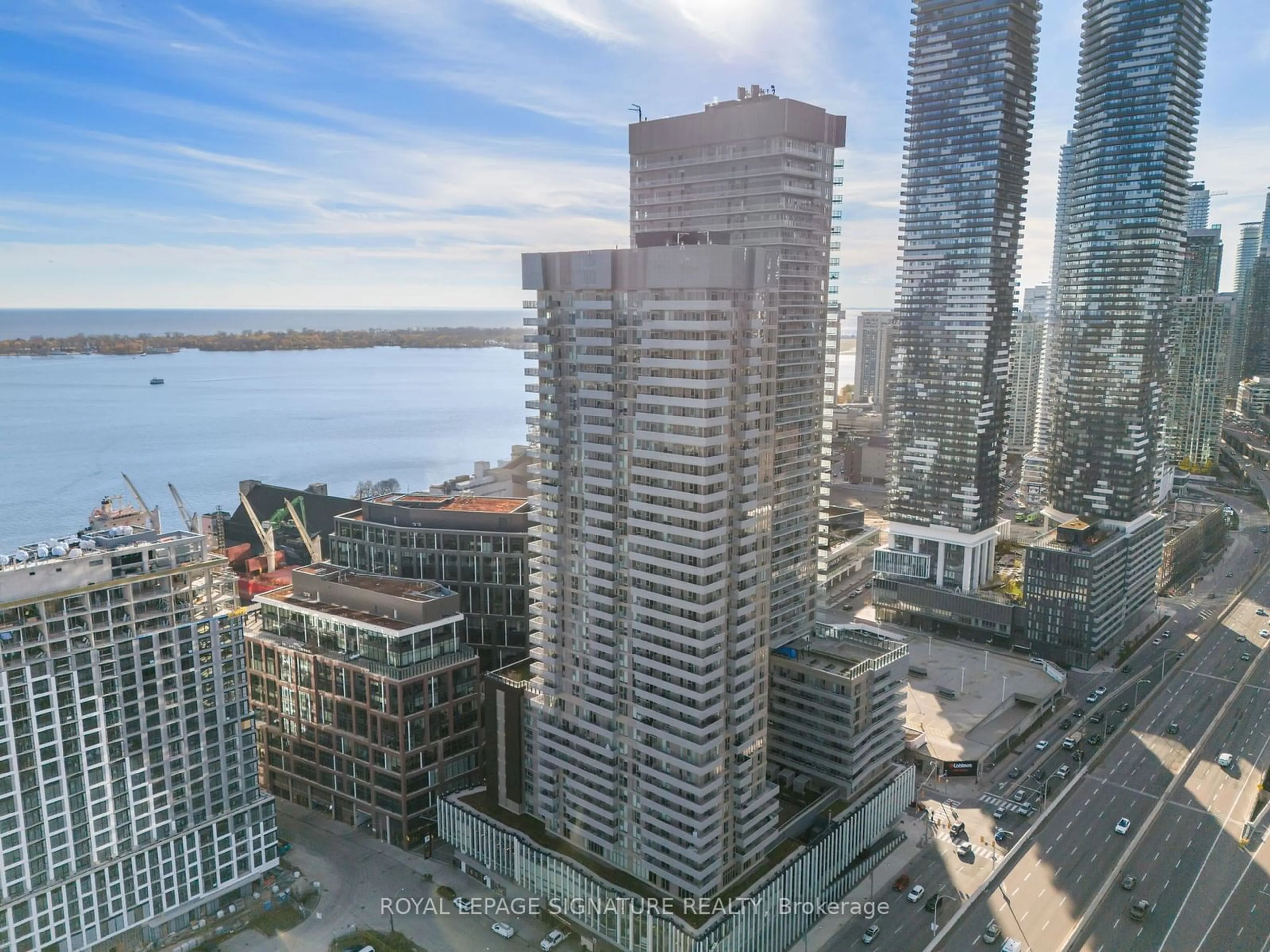 A pic from exterior of the house or condo, the view of city buildings for 20 Richardson St #1018, Toronto Ontario M5A 4J9