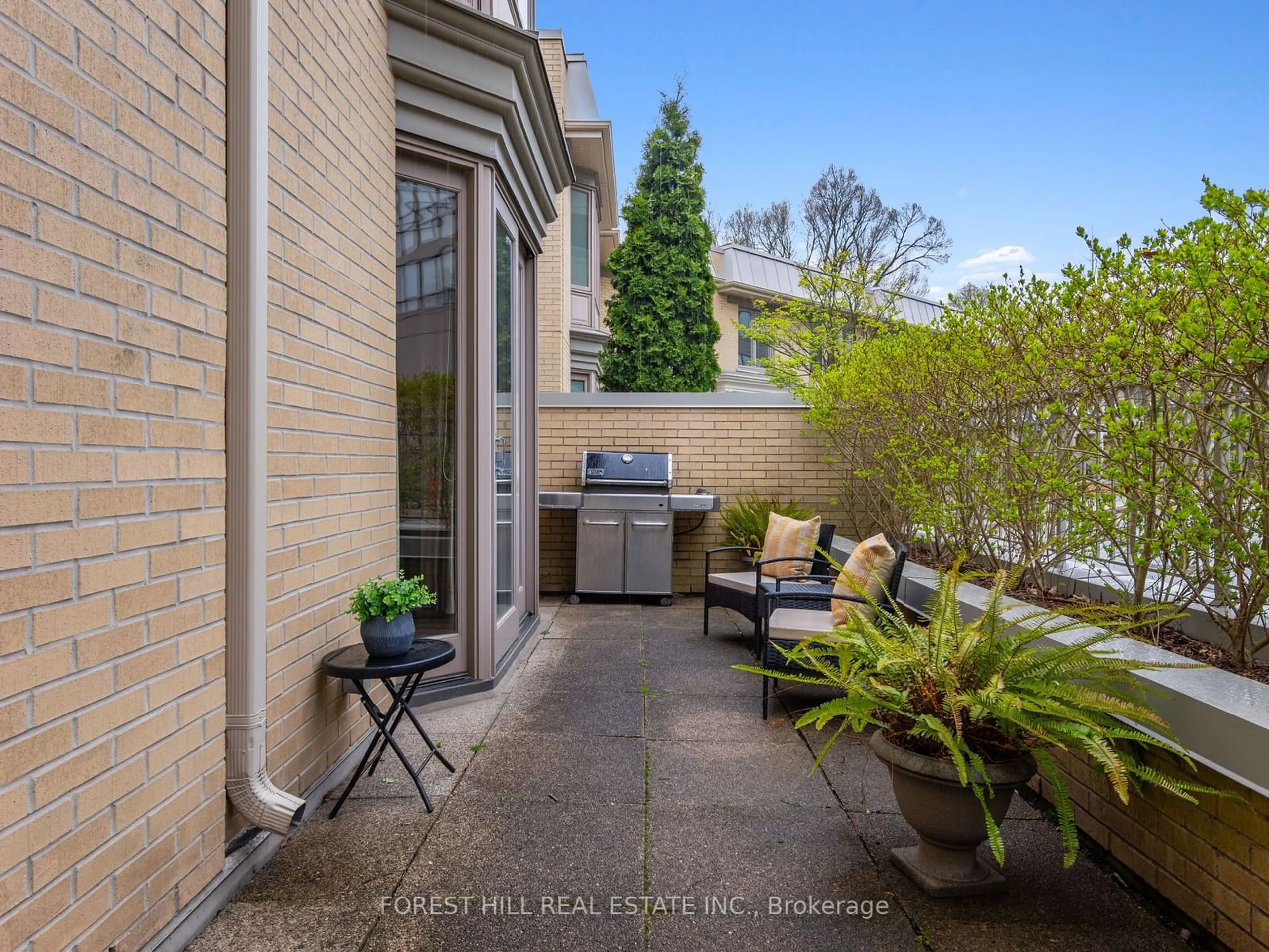 Patio, the fenced backyard for 30 Lower Village Gate, Toronto Ontario M5P 3L7