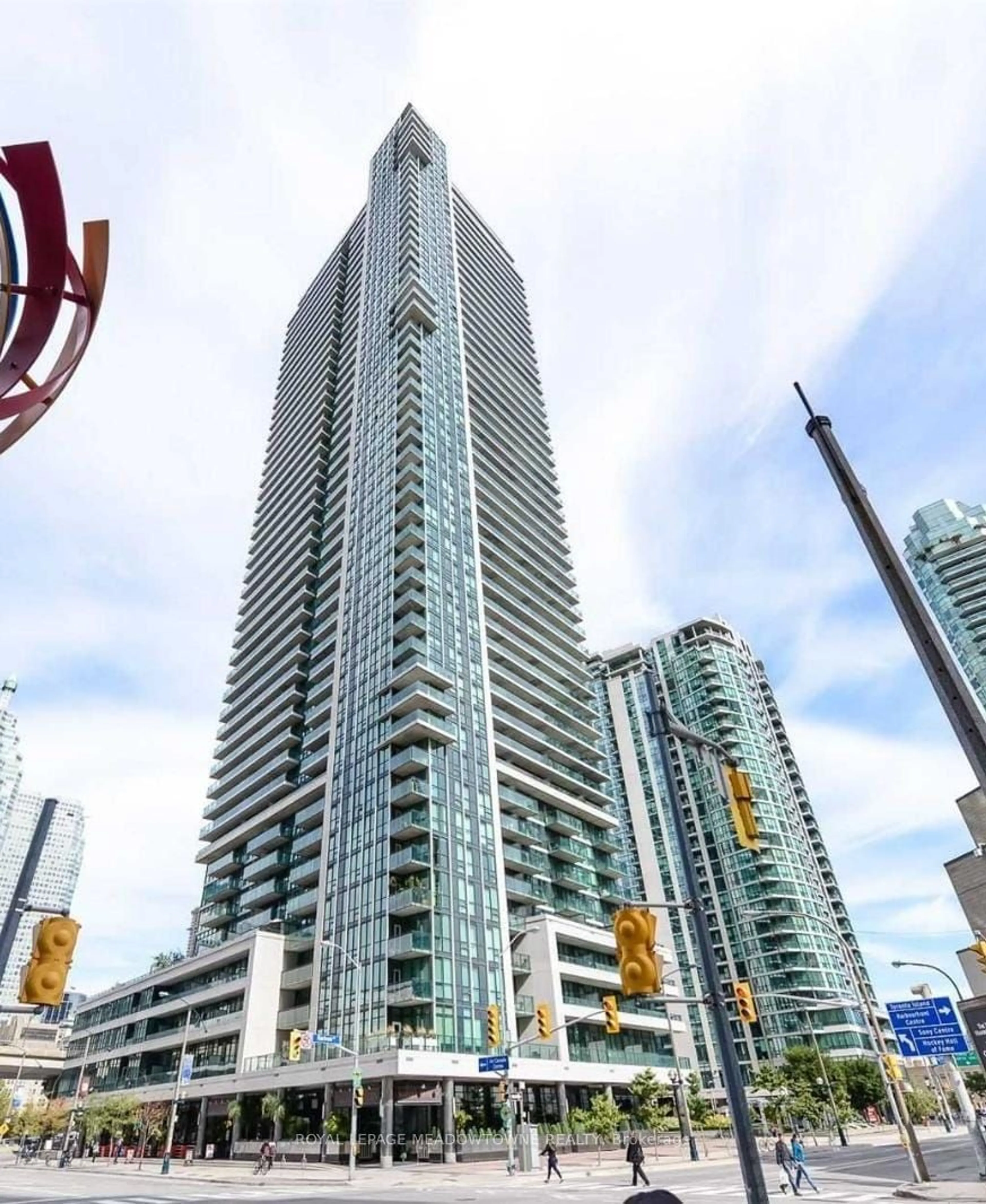 A pic from exterior of the house or condo, the view of city buildings for 33 Bay St #1203, Toronto Ontario M5J 2Z3