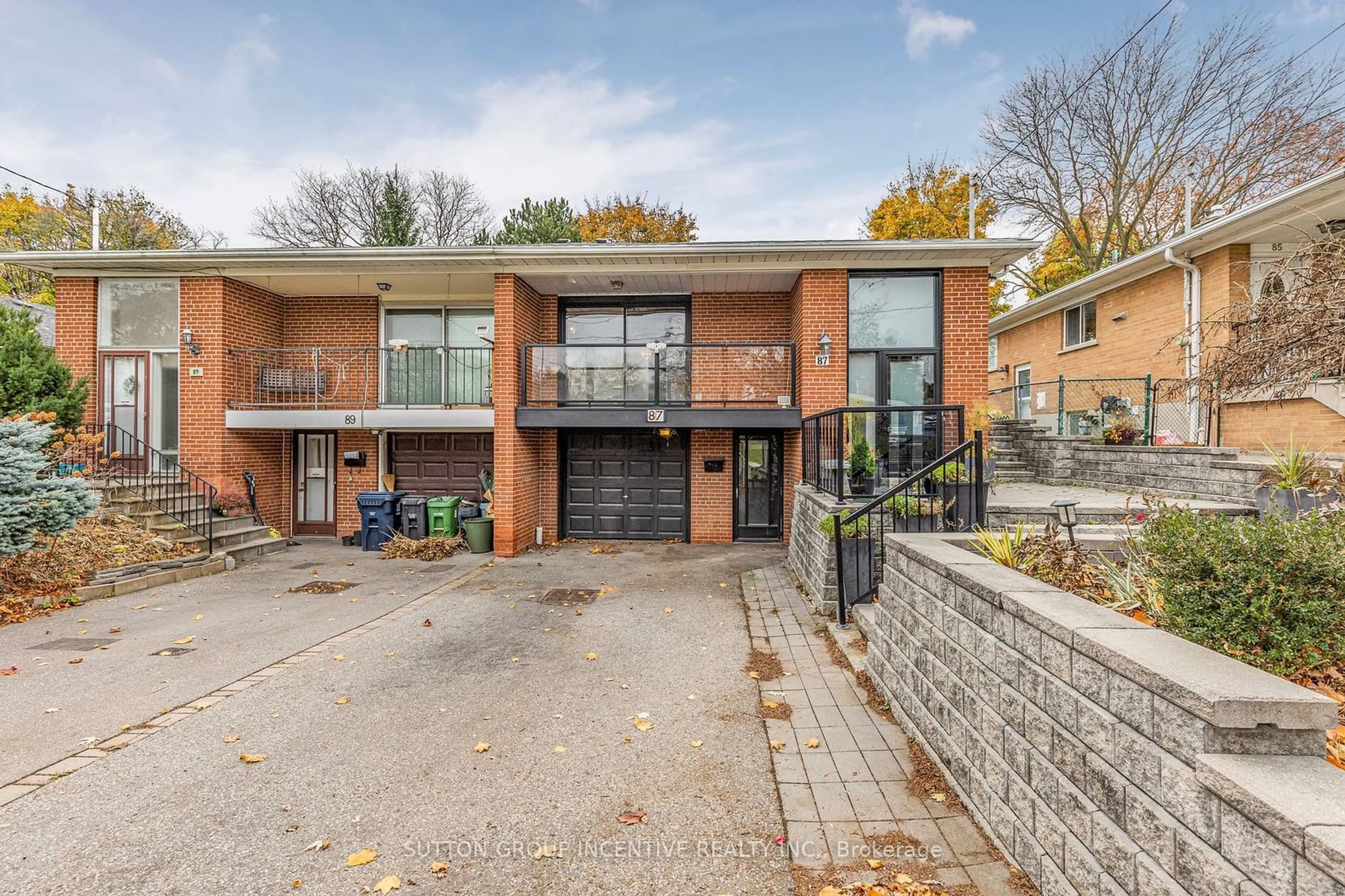 Home with brick exterior material for 87 Northey Dr, Toronto Ontario M2L 2S8