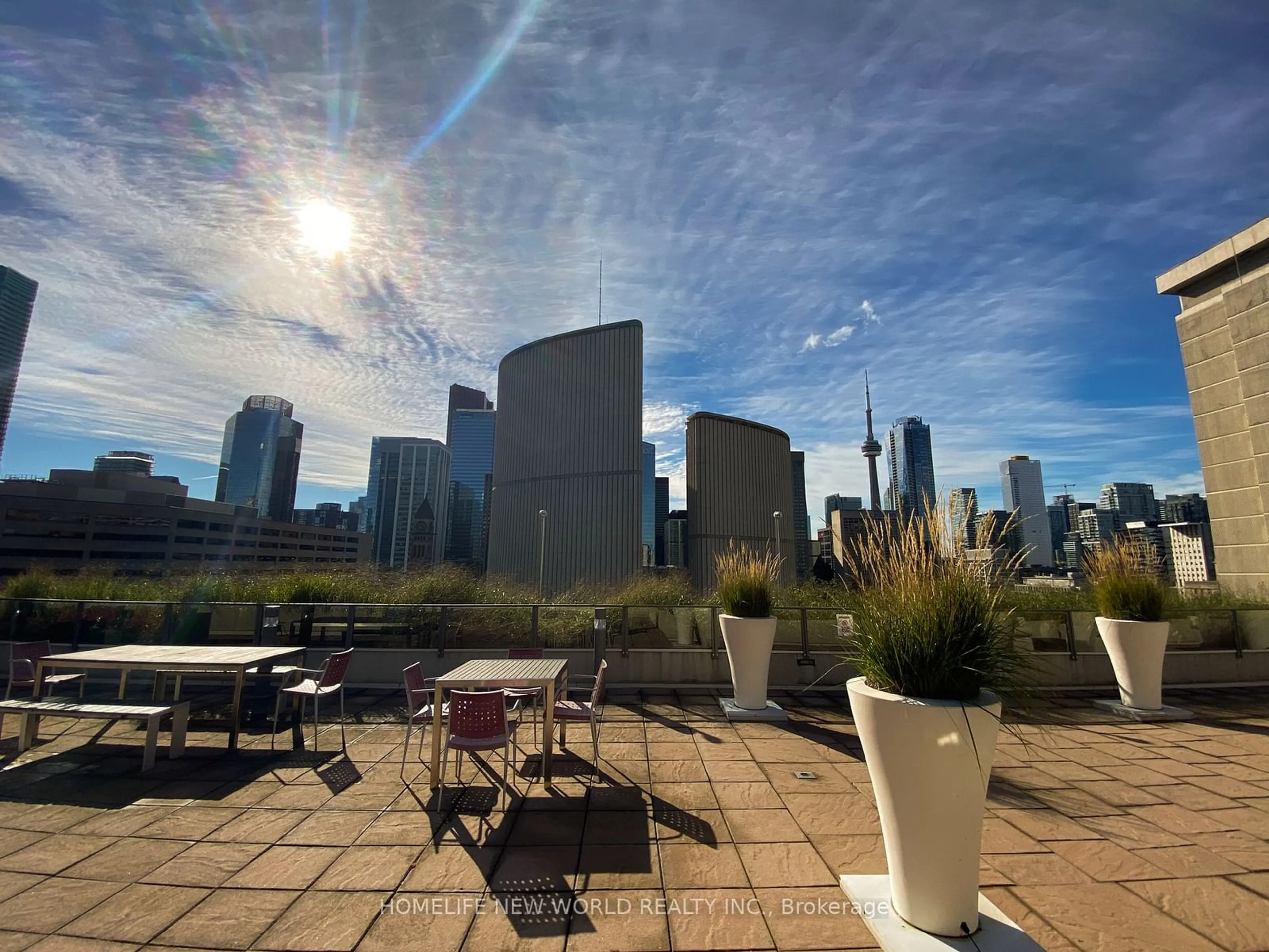 Patio, the view of city buildings for 111 Elizabeth St #515, Toronto Ontario M5G 1P7