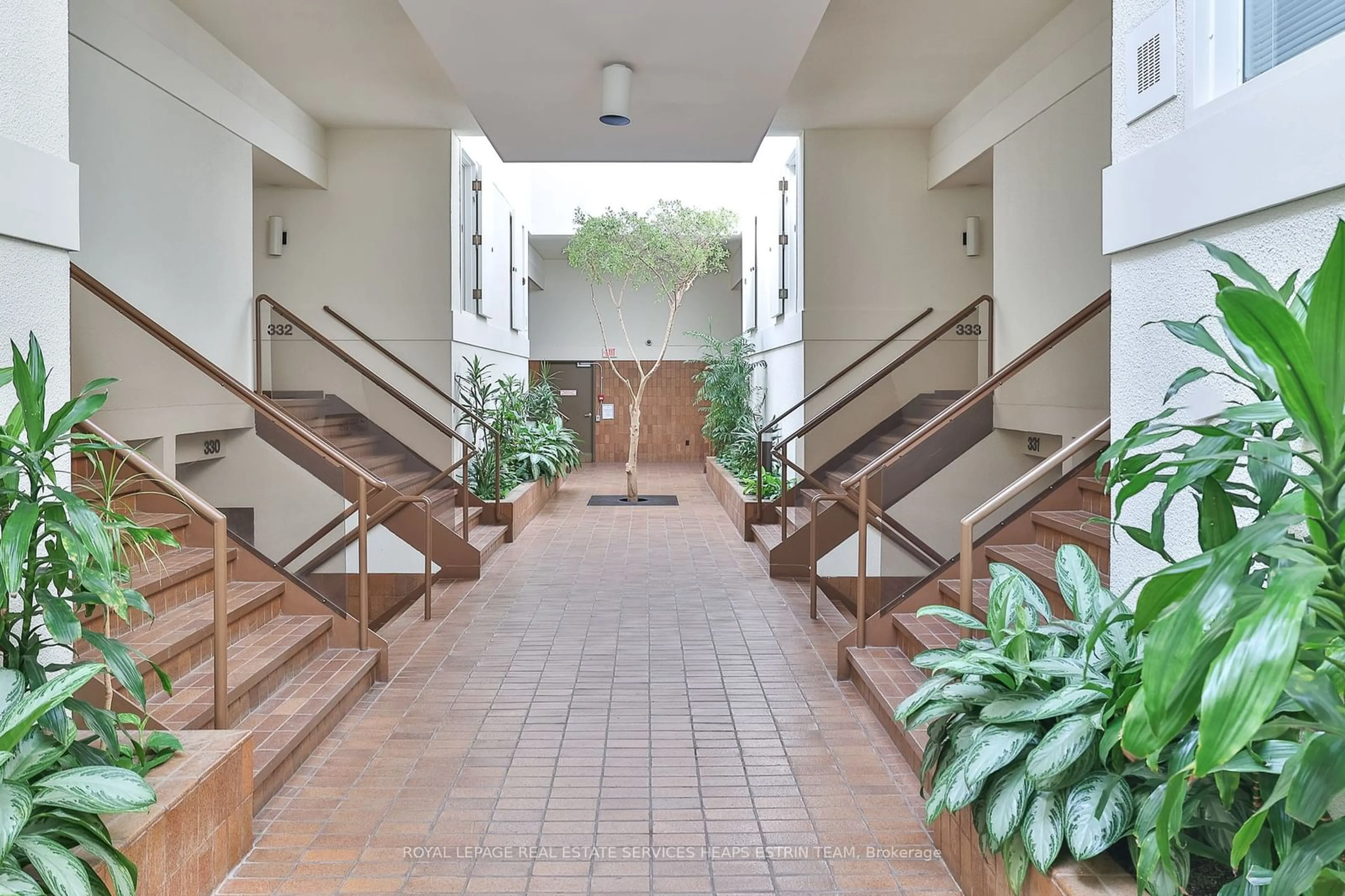 Indoor lobby, cement floor for 40 Oaklands Ave #337, Toronto Ontario M4V 2Z3