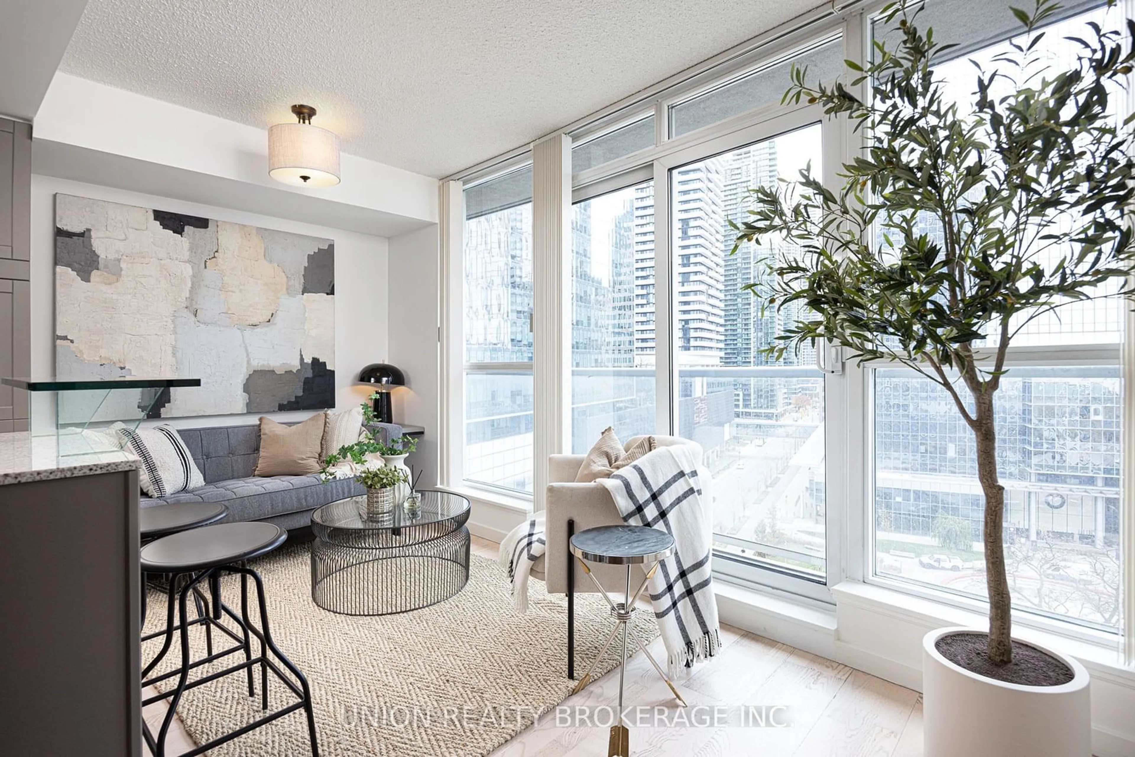 Living room, carpet floors for 8 York St #1104, Toronto Ontario M5J 2Y2