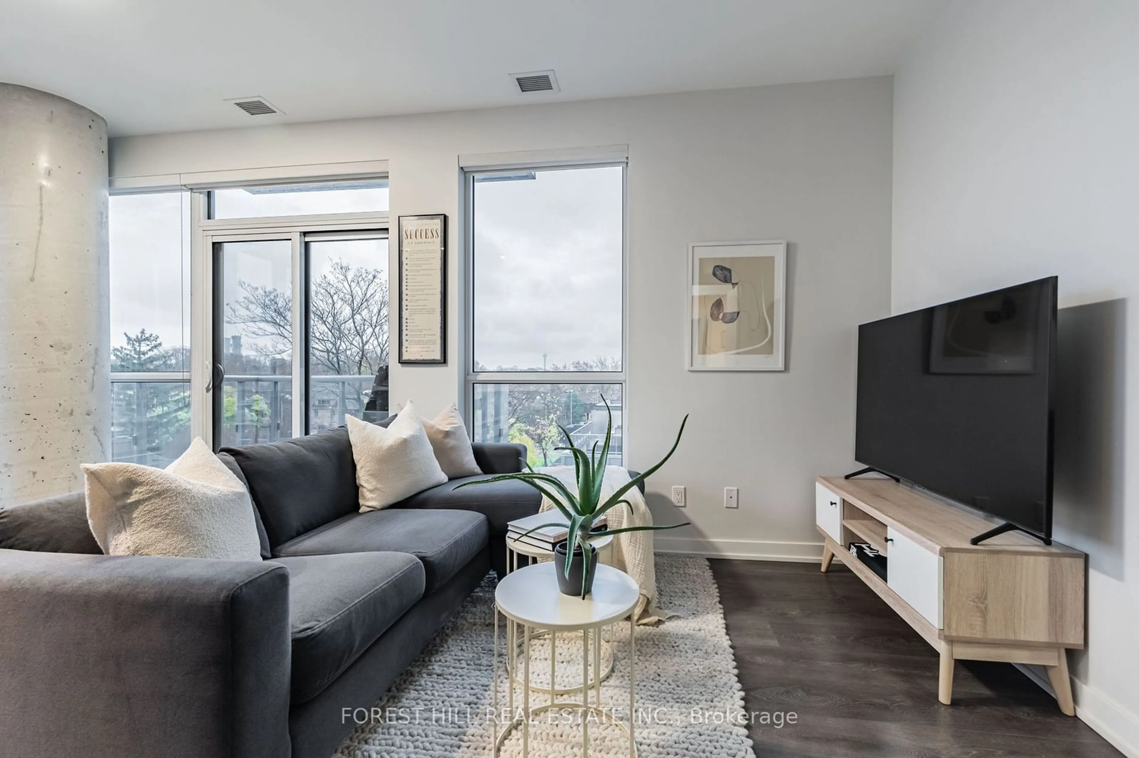 Living room, wood floors for 501 St. Clair Ave #407, Toronto Ontario M5P 0A2