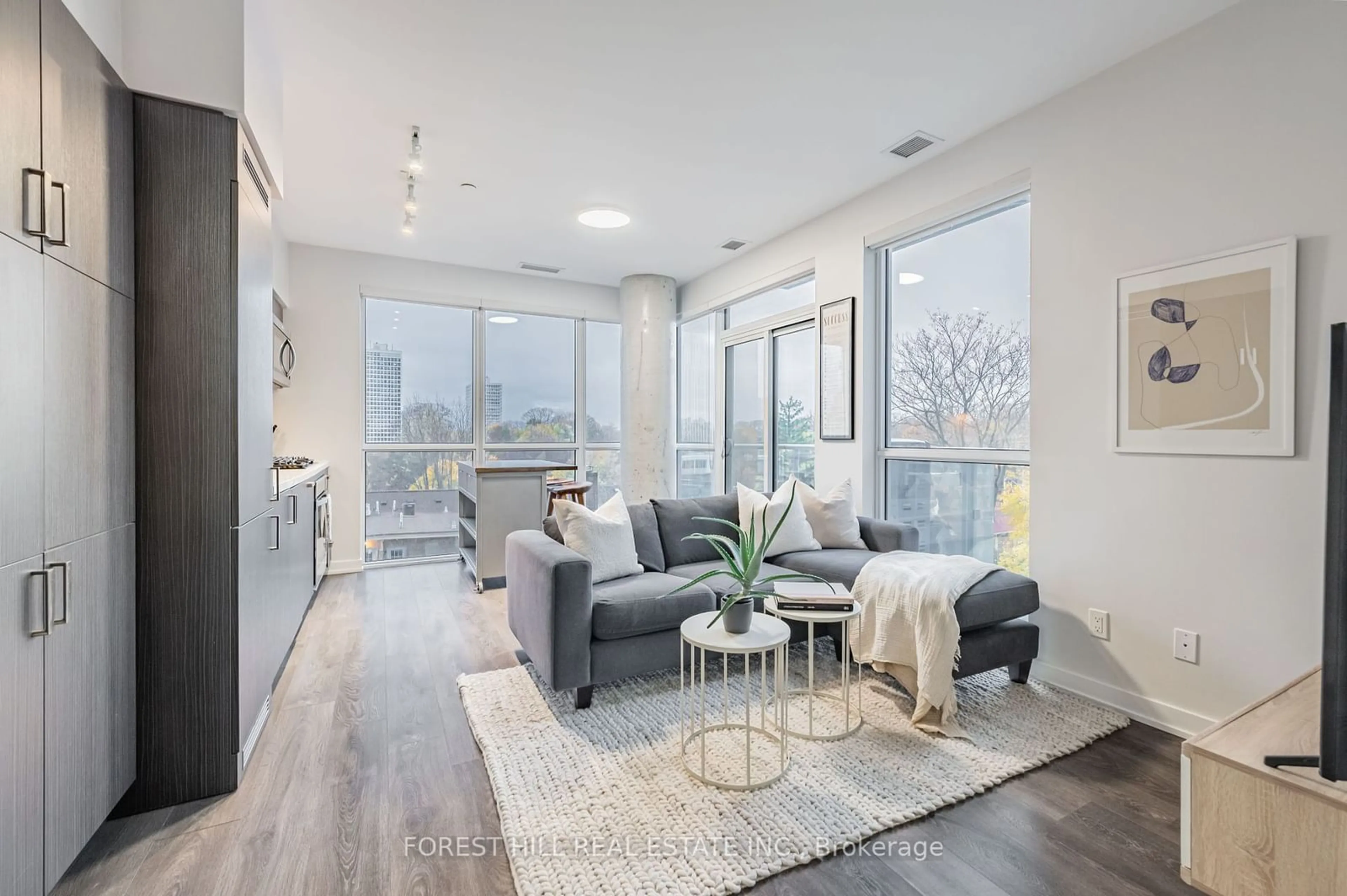 Living room, wood floors for 501 St. Clair Ave #407, Toronto Ontario M5P 0A2