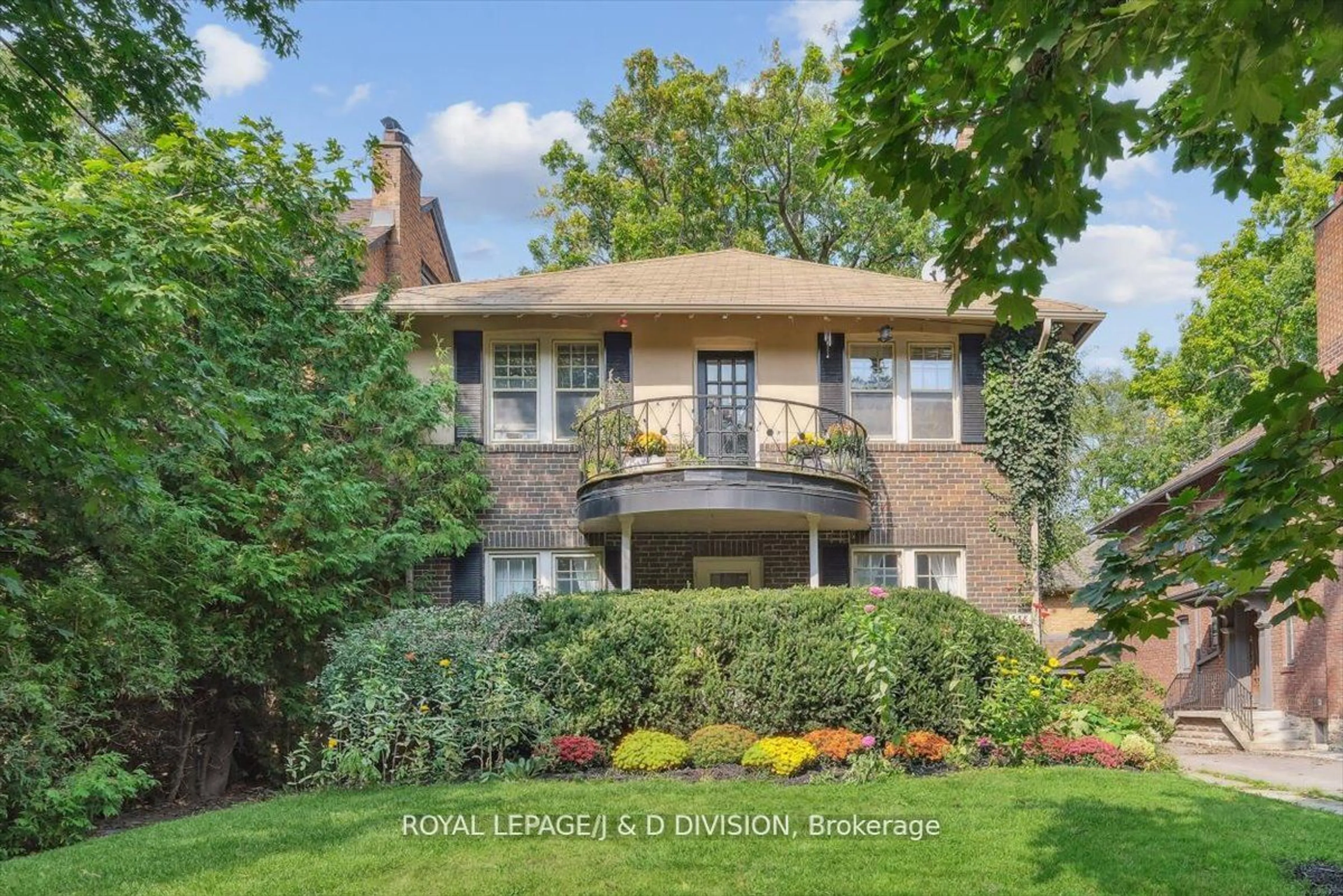 Frontside or backside of a home, the fenced backyard for 338 St Clair Ave, Toronto Ontario M4T 1P4