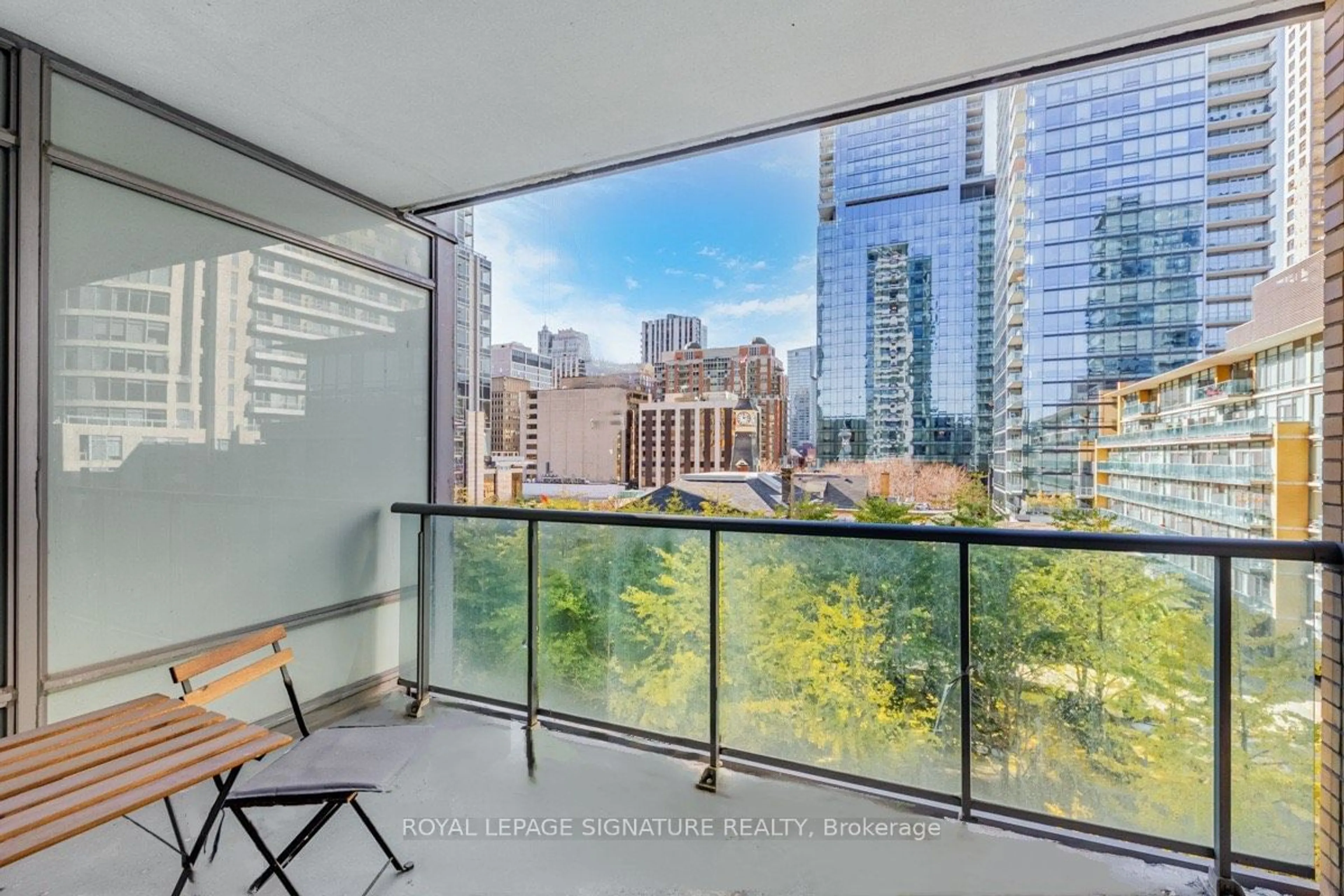 Balcony in the apartment, the view of city buildings for 18 Yorkville Ave #508, Toronto Ontario M4W 3Y8