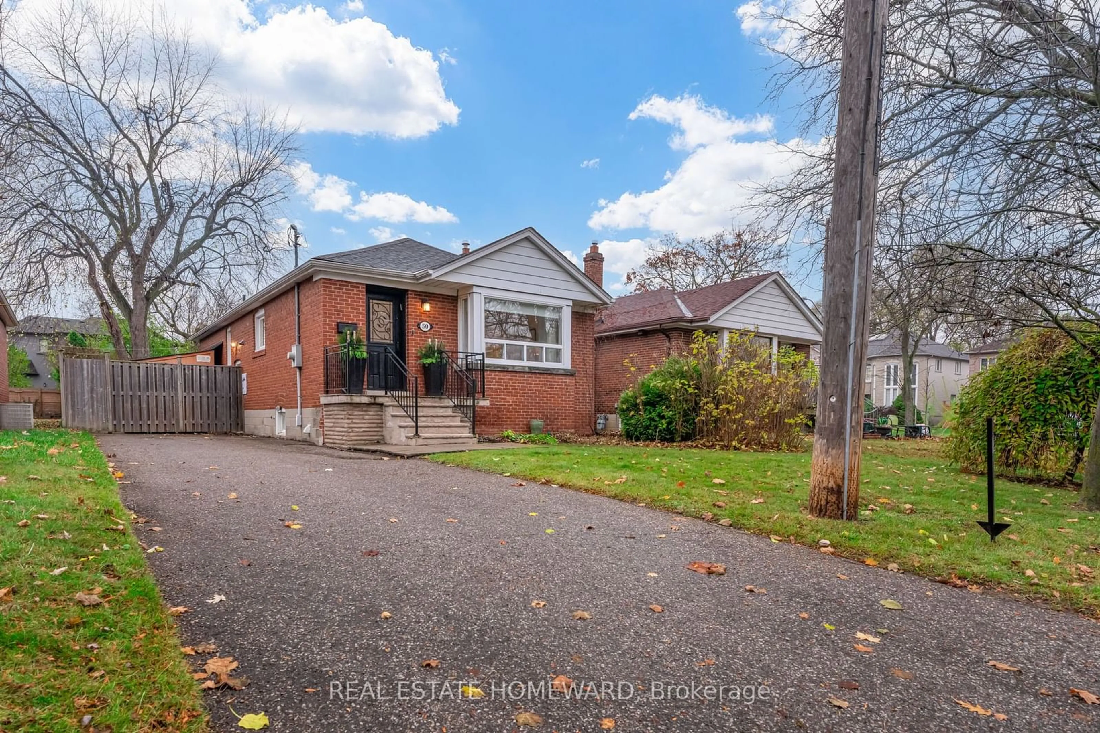 Frontside or backside of a home, the street view for 50 King High Ave, Toronto Ontario M3H 3A7