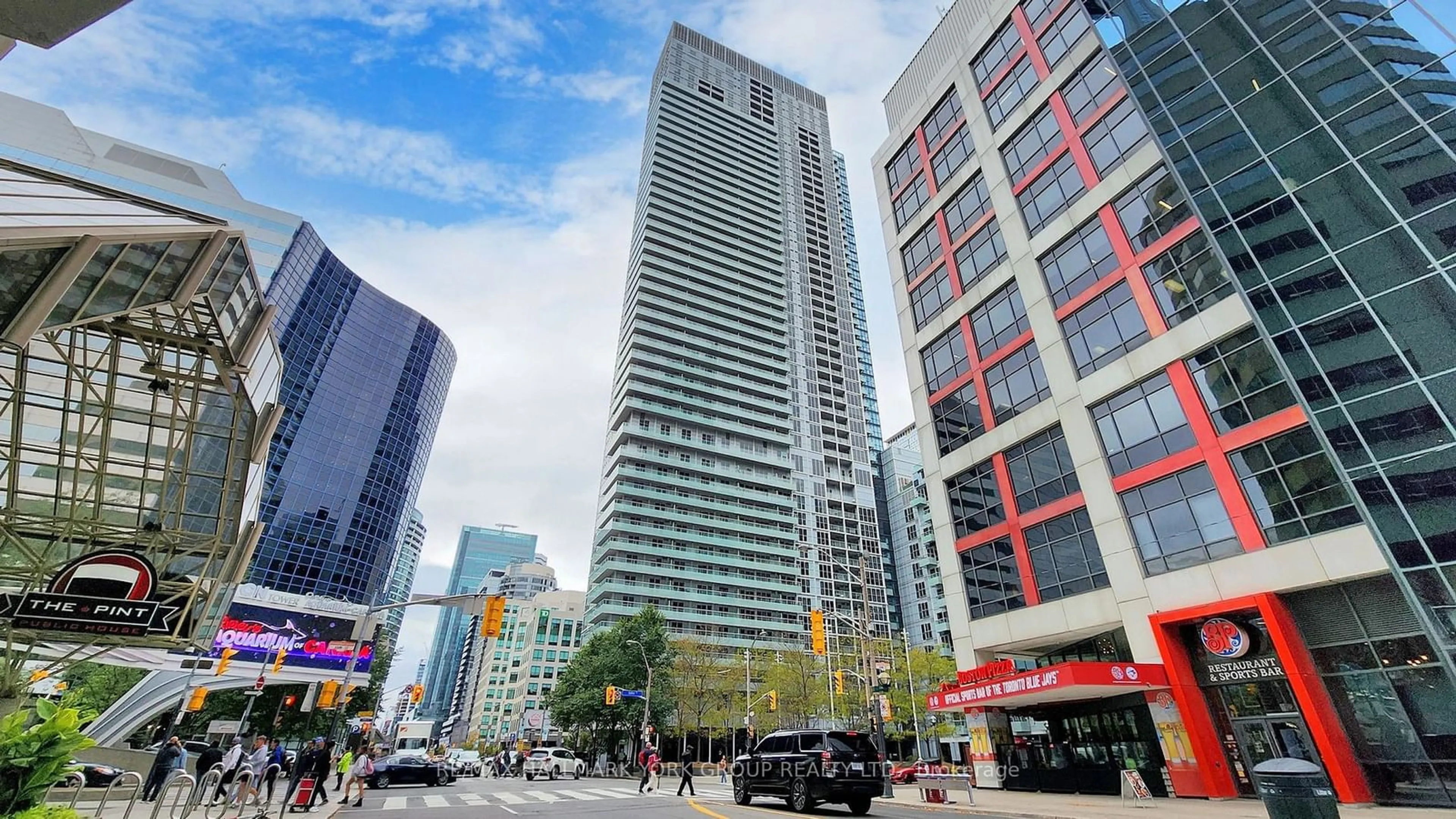 A pic from exterior of the house or condo, the view of city buildings for 300 Front St #714, Toronto Ontario M5V 0E9