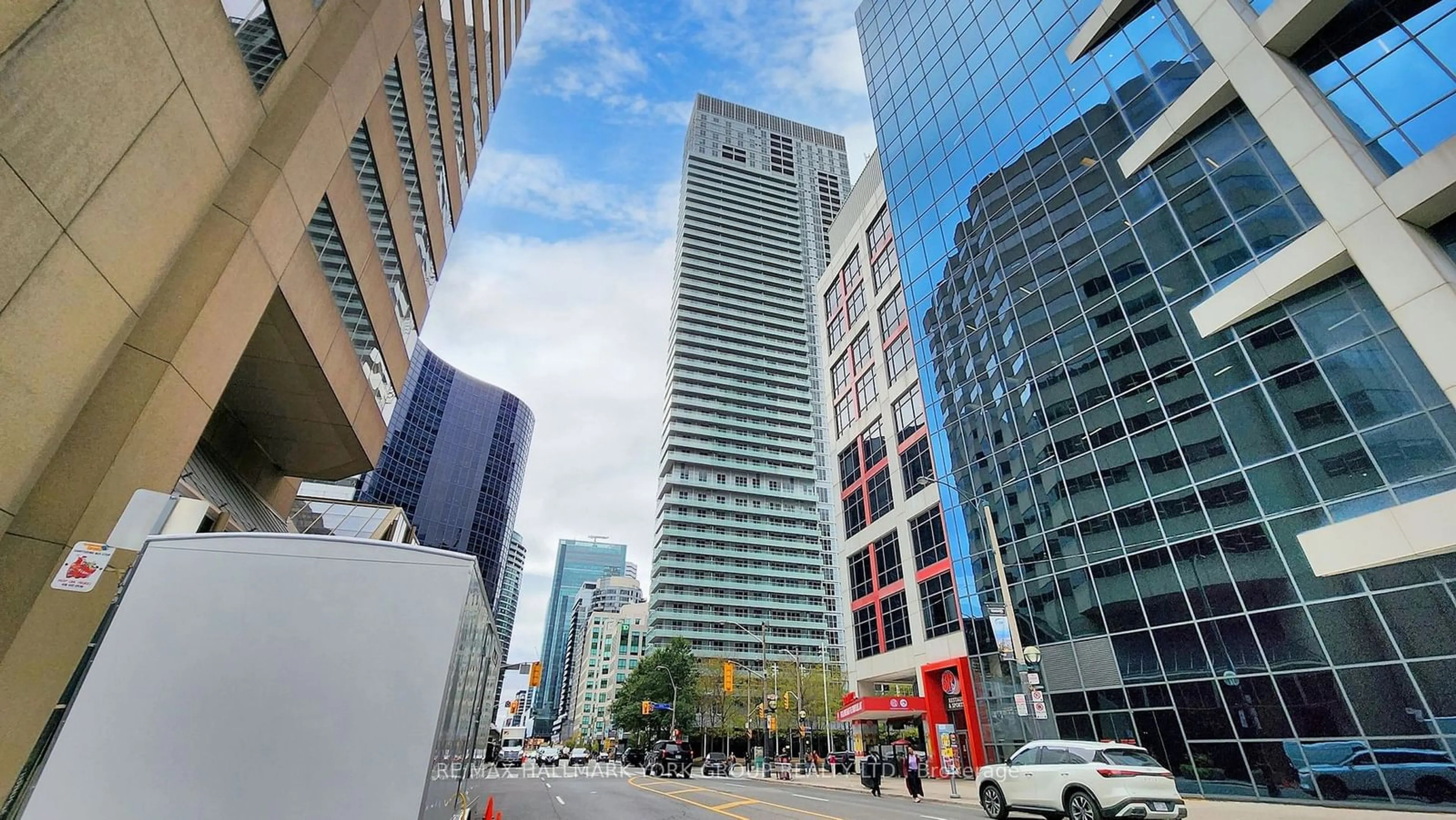 A pic from exterior of the house or condo, the view of city buildings for 300 Front St #714, Toronto Ontario M5V 0E9