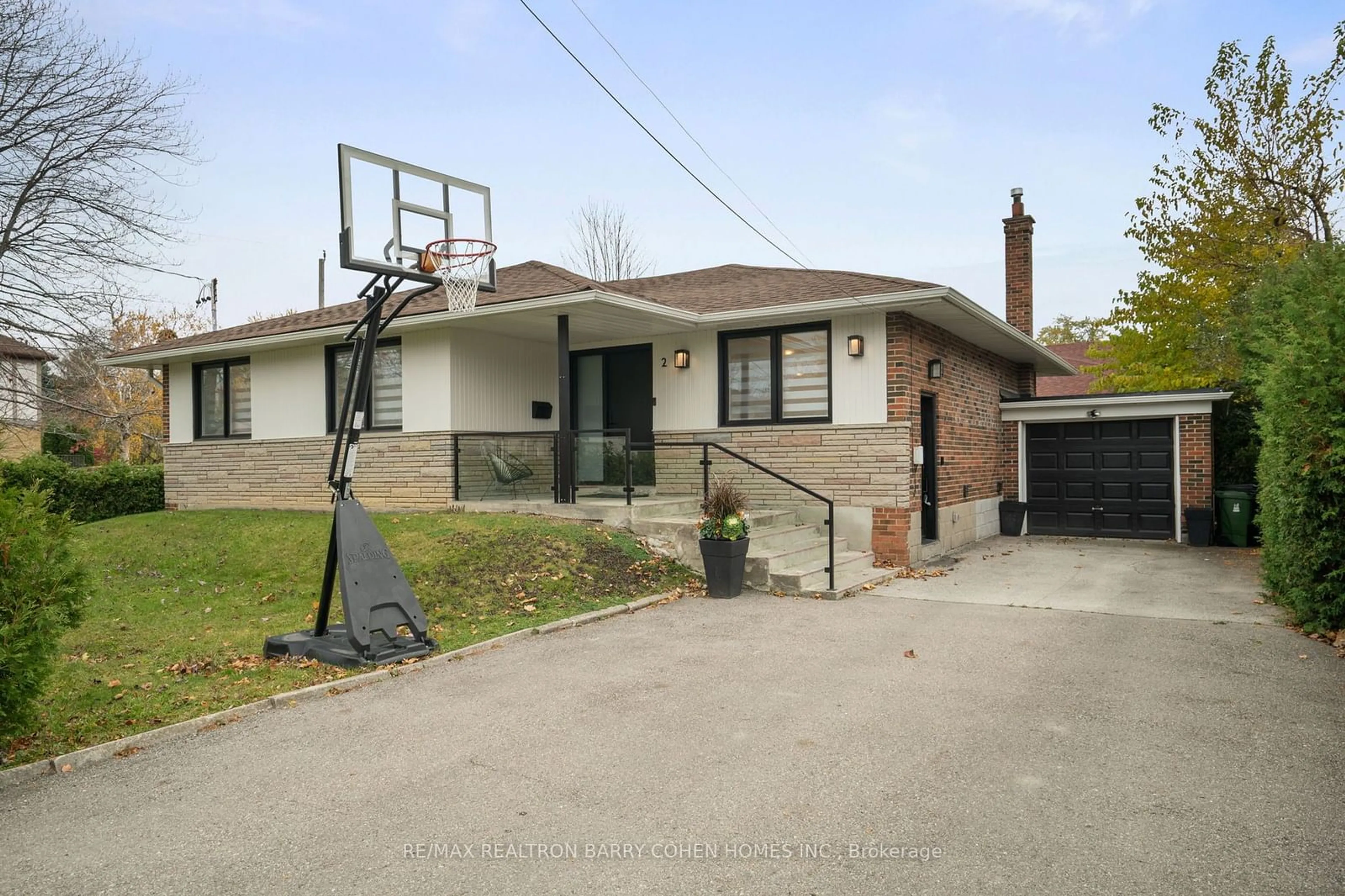 Frontside or backside of a home, the street view for 2 Josephine Rd, Toronto Ontario M3H 3G4