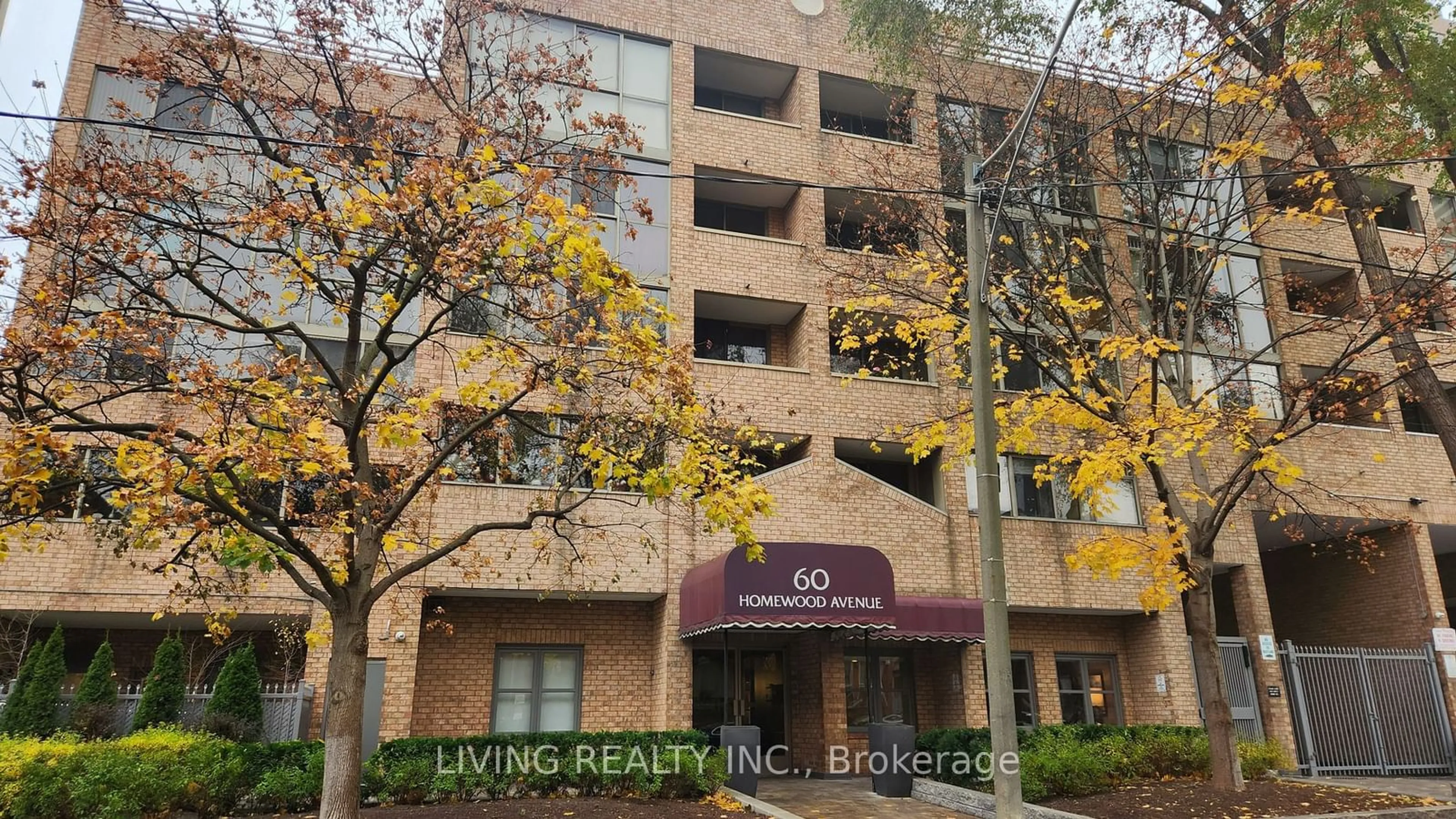 A pic from exterior of the house or condo, the front or back of building for 60 Homewood Ave #536, Toronto Ontario M4Y 2X4