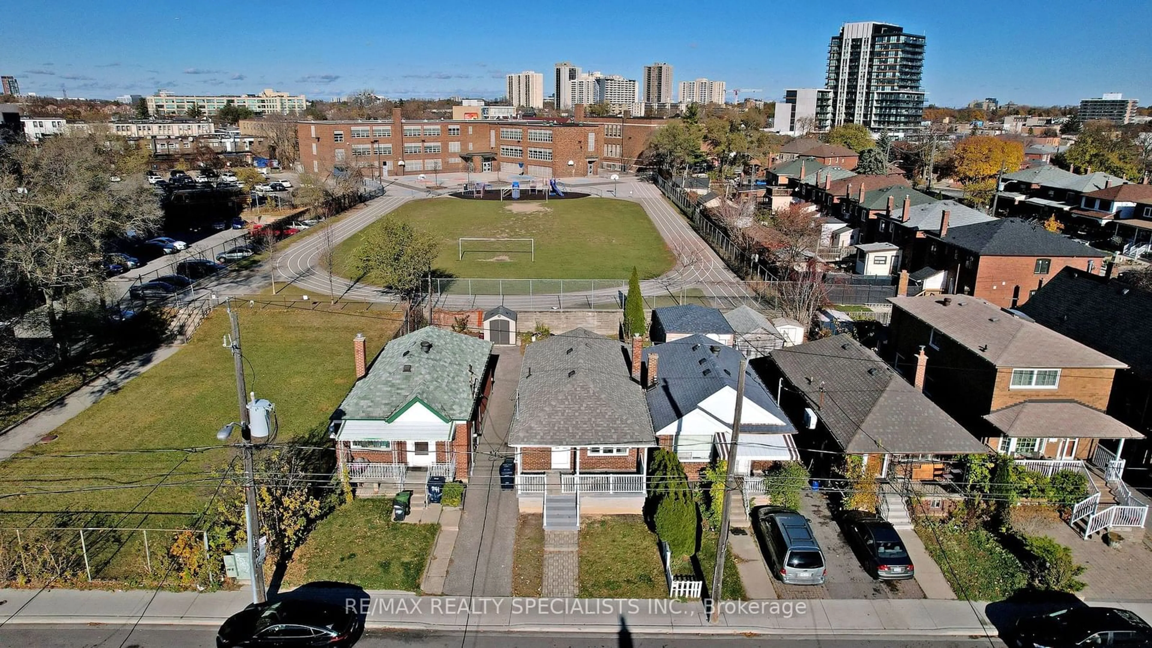 A pic from exterior of the house or condo, the fenced backyard for 739 Vaughan Rd, Toronto Ontario M6E 2Z2