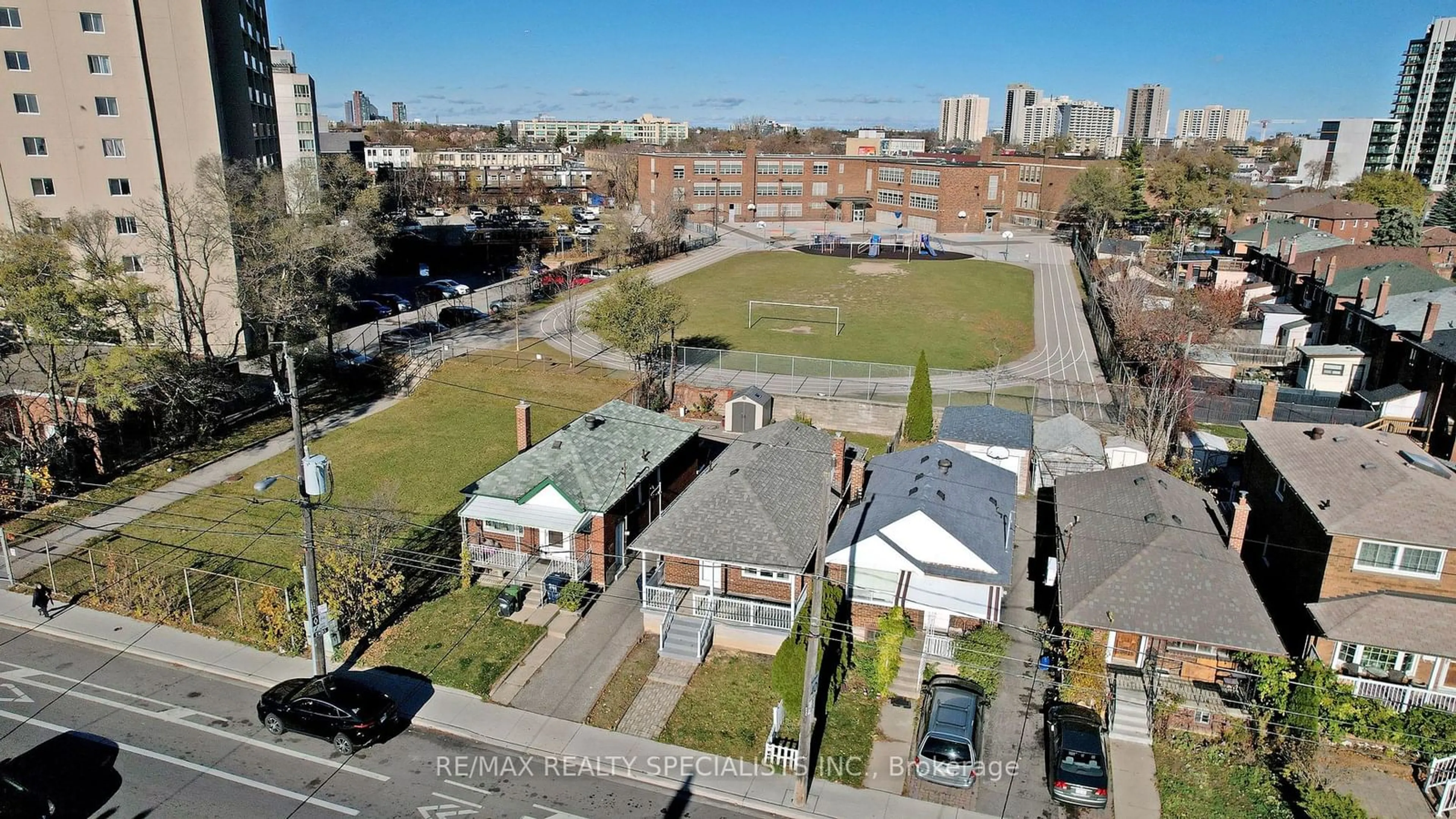 A pic from exterior of the house or condo, the fenced backyard for 739 Vaughan Rd, Toronto Ontario M6E 2Z2