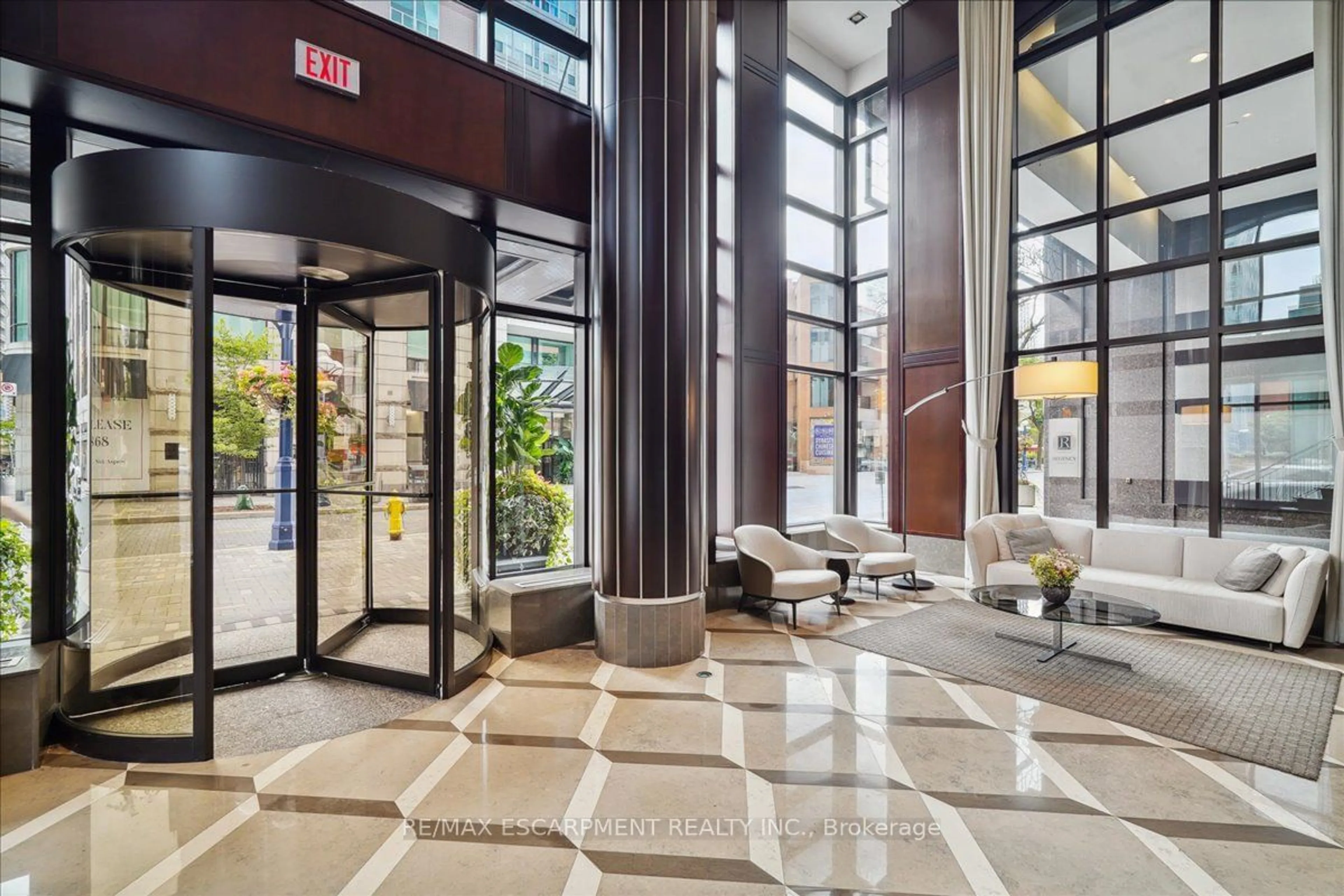 Indoor lobby, ceramic floors for 68 Yorkville Ave #304, Toronto Ontario M5R 3V7