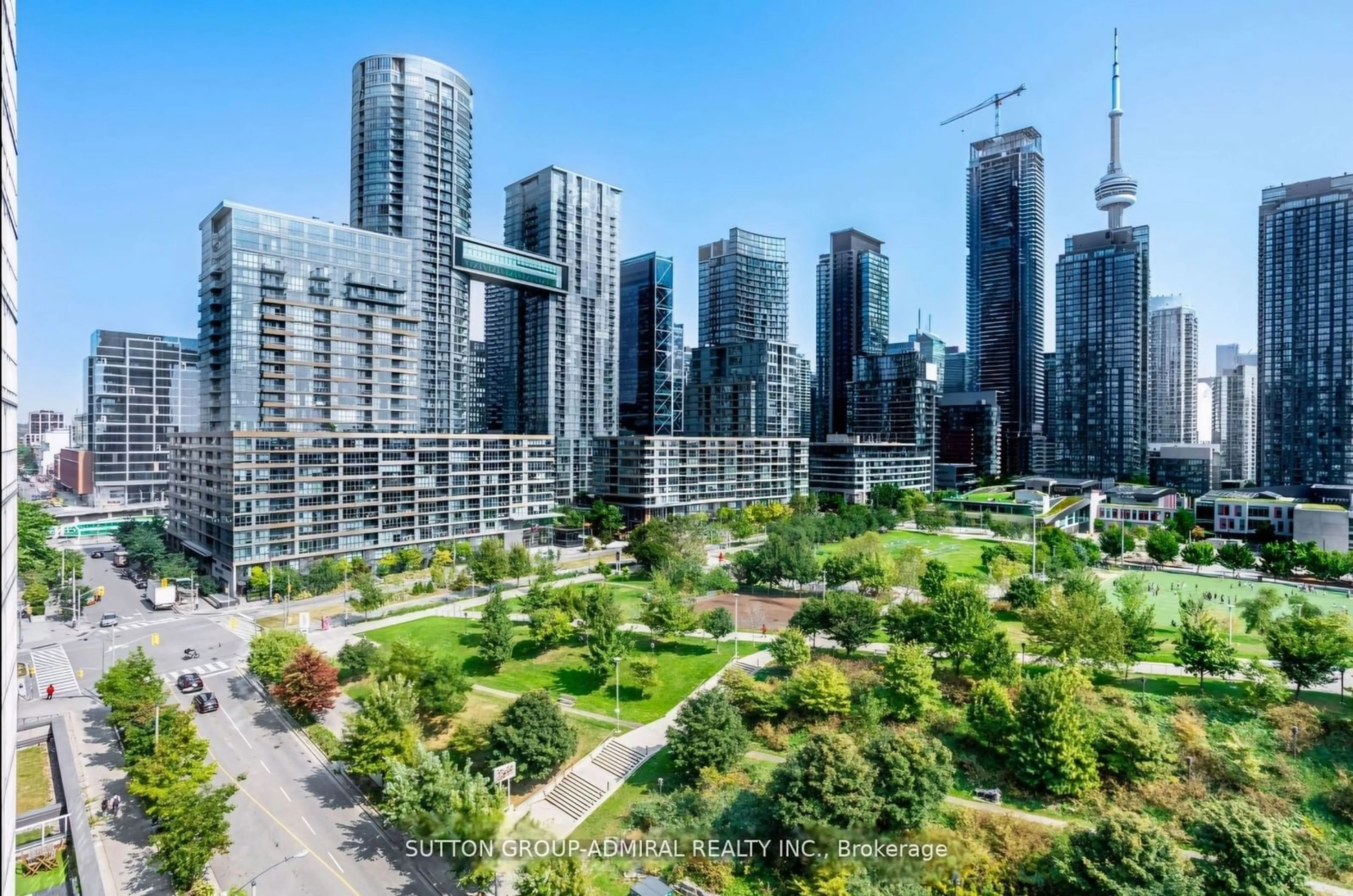 A pic from exterior of the house or condo, the view of city buildings for 75 Queens Wharf Rd #1103, Toronto Ontario M5V 0J8