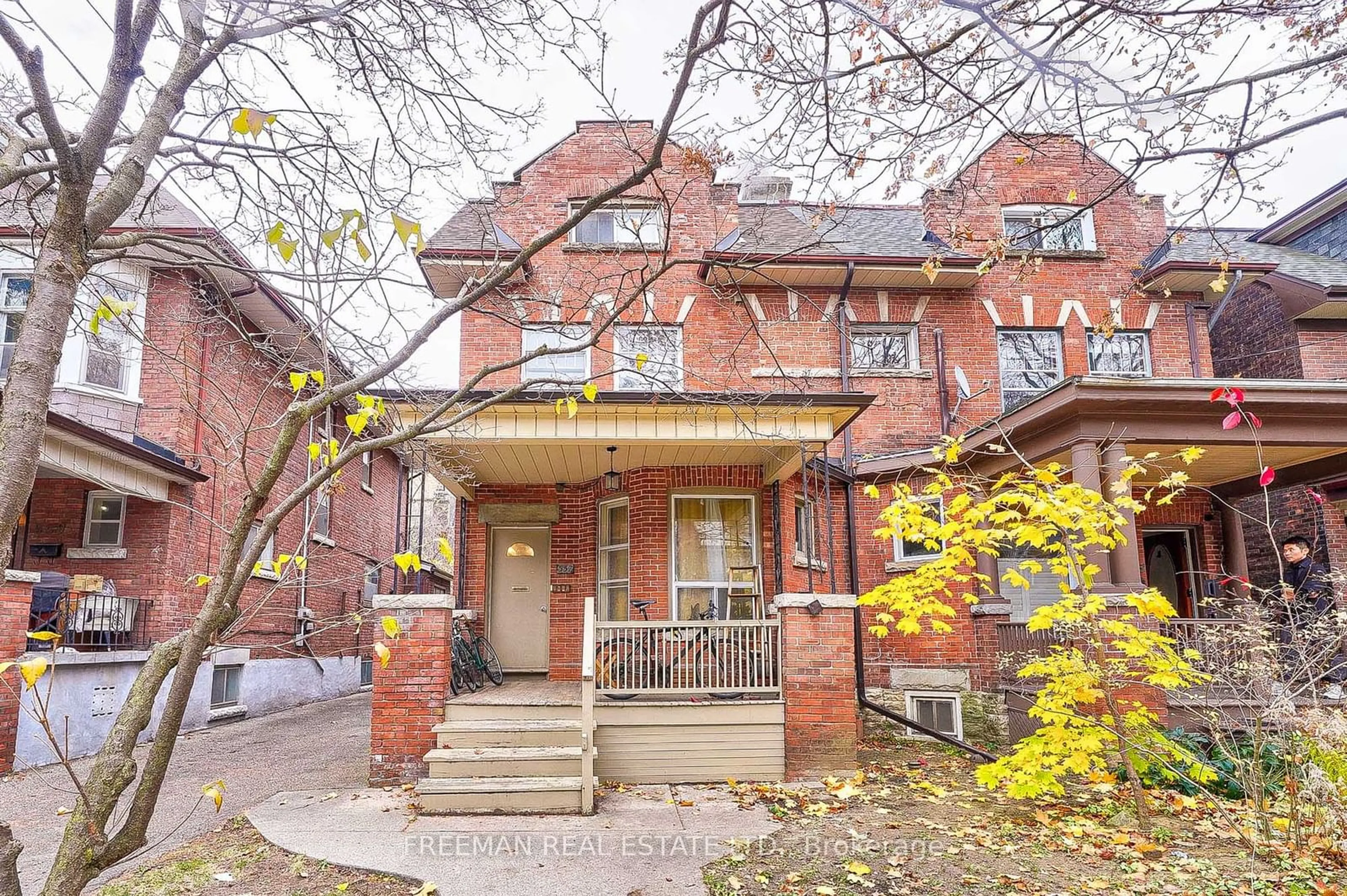 A pic from exterior of the house or condo, the street view for 557 Markham St, Toronto Ontario M6G 2L6