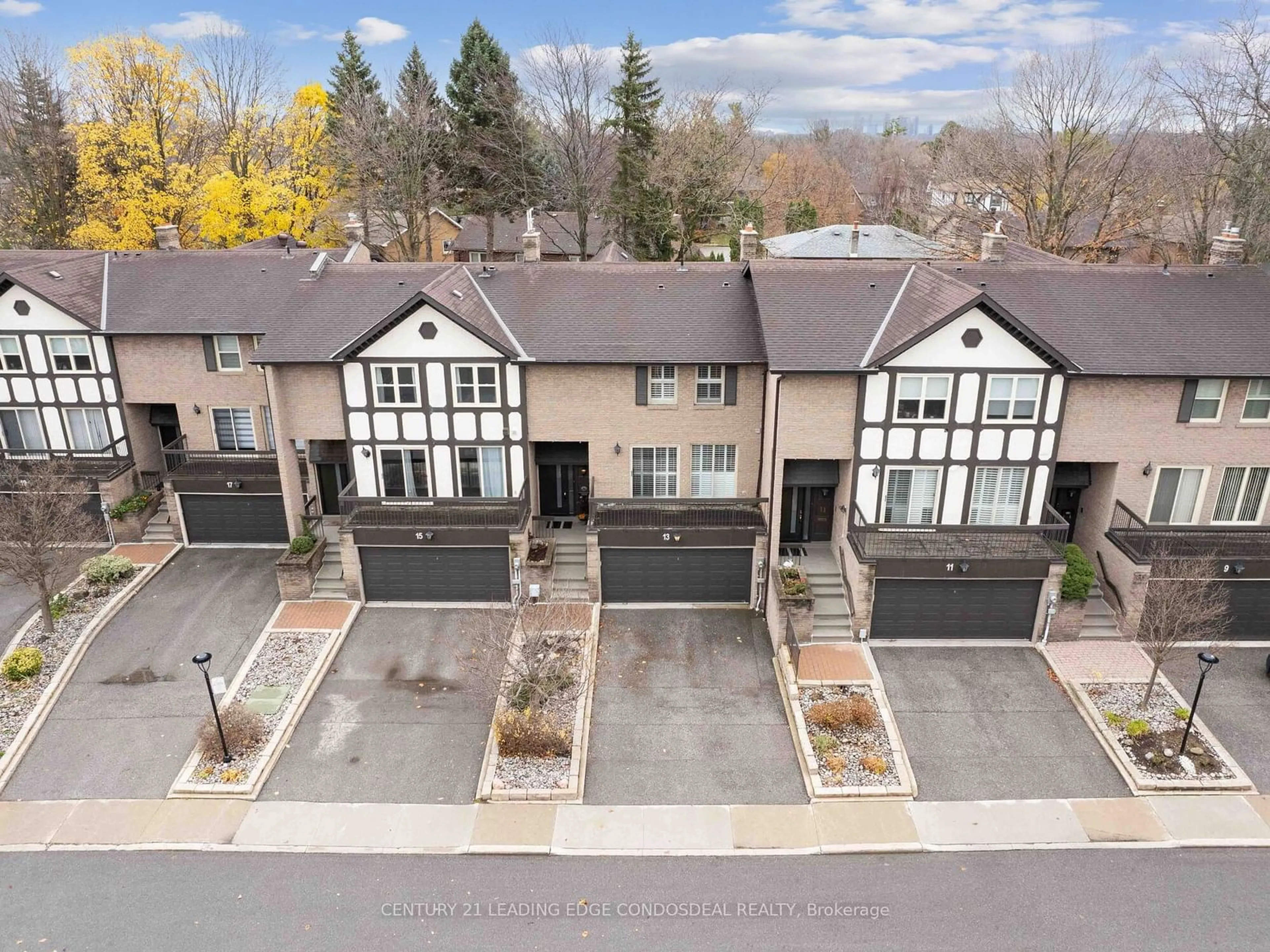 A pic from exterior of the house or condo, the fenced backyard for 13 Morning Glory Way, Toronto Ontario M2H 3M1