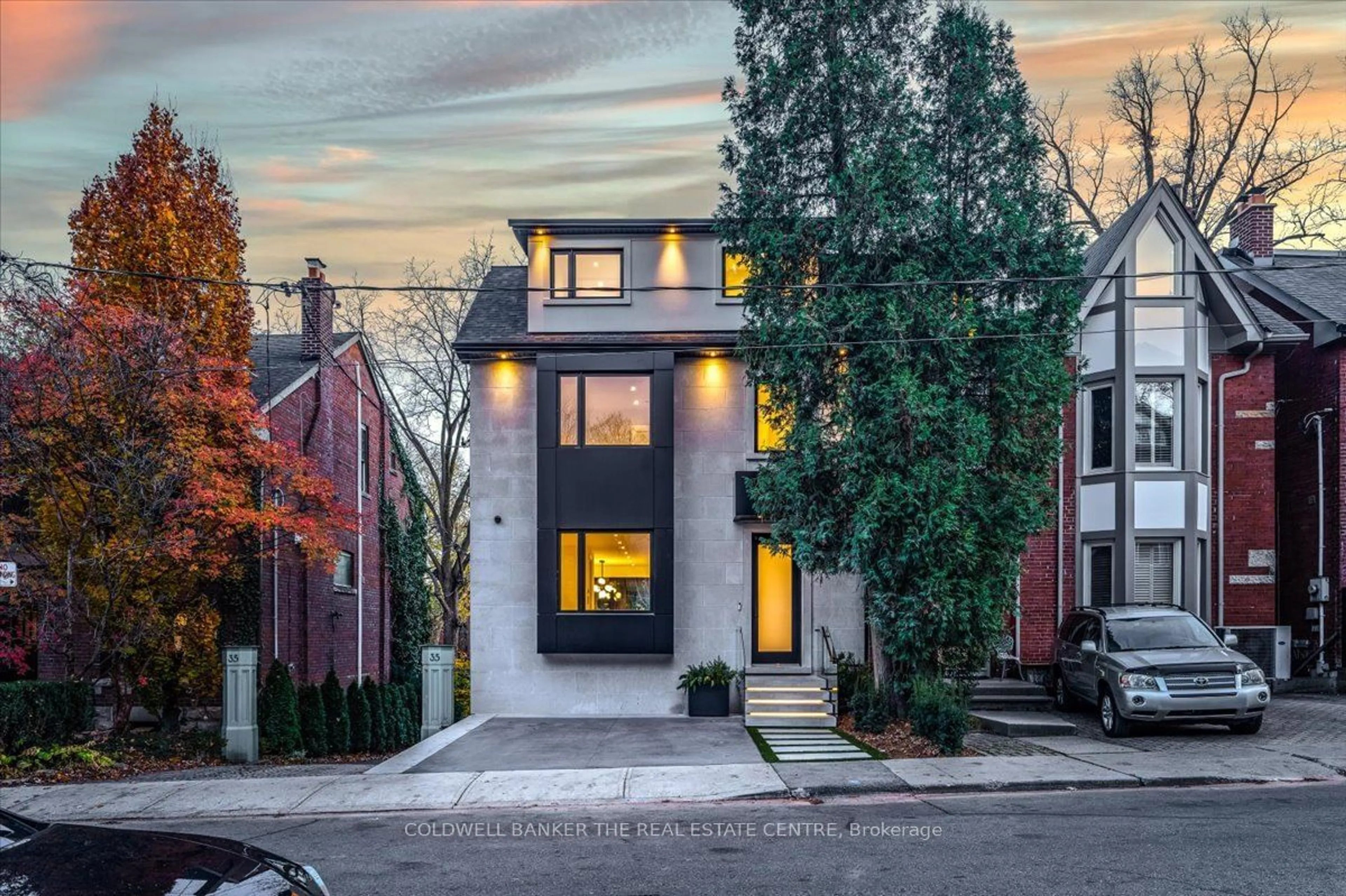 A pic from exterior of the house or condo, the street view for 37 Woodlawn Ave, Toronto Ontario M4V 1G6