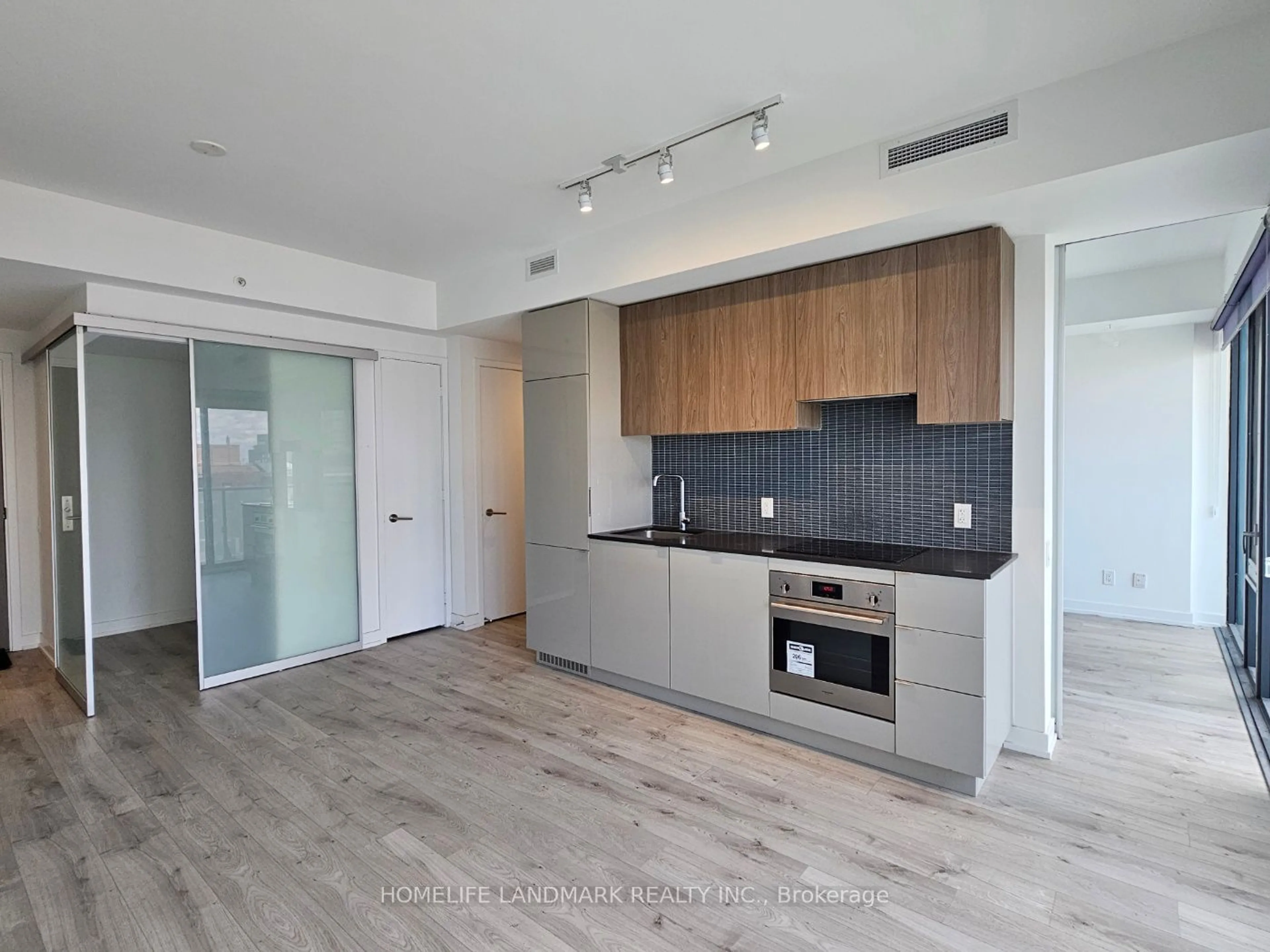 Open concept kitchen for 161 Roehampton Ave #1502, Toronto Ontario M4P 1P9