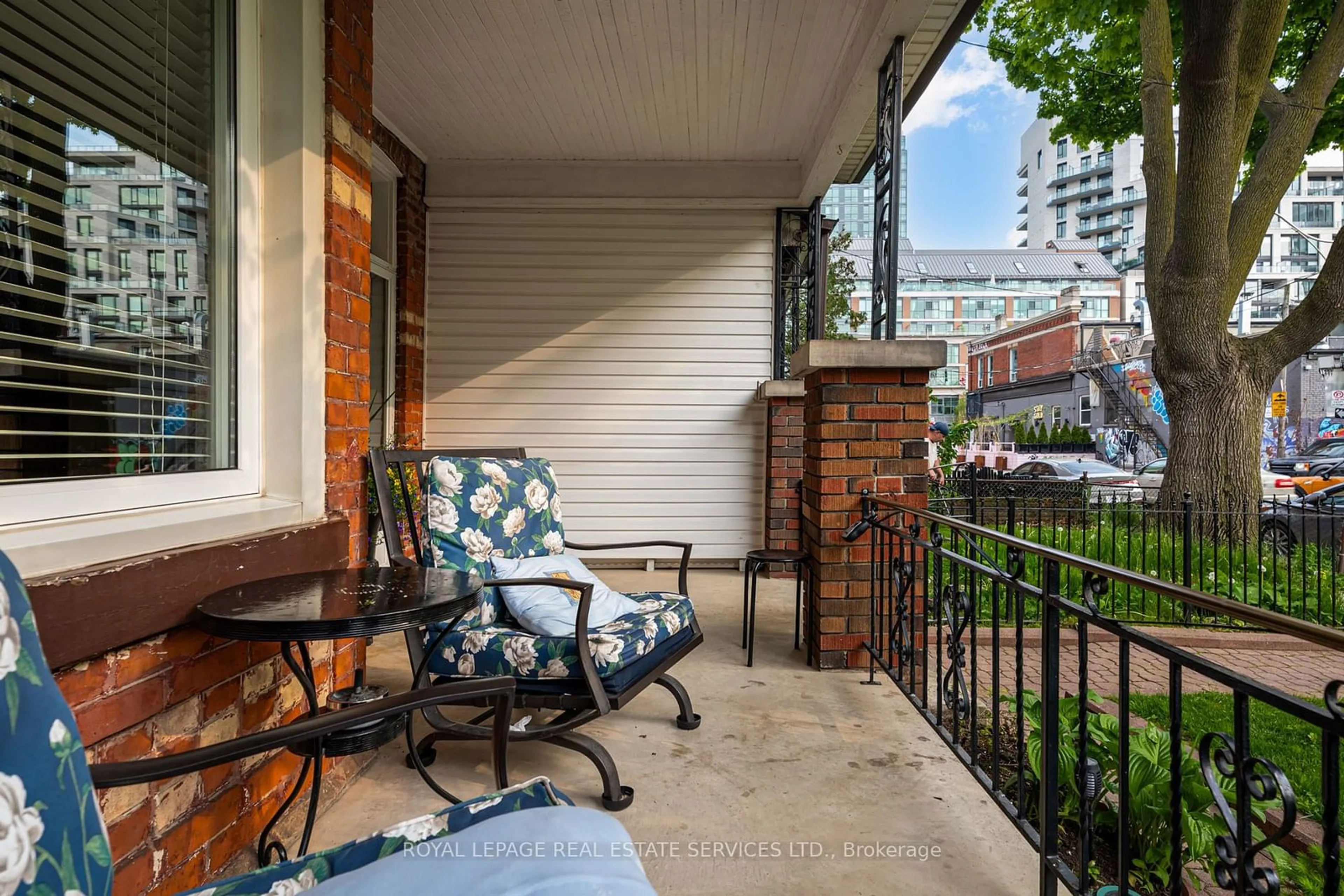 Patio, the fenced backyard for 11 Northcote Ave, Toronto Ontario M6J 3K2