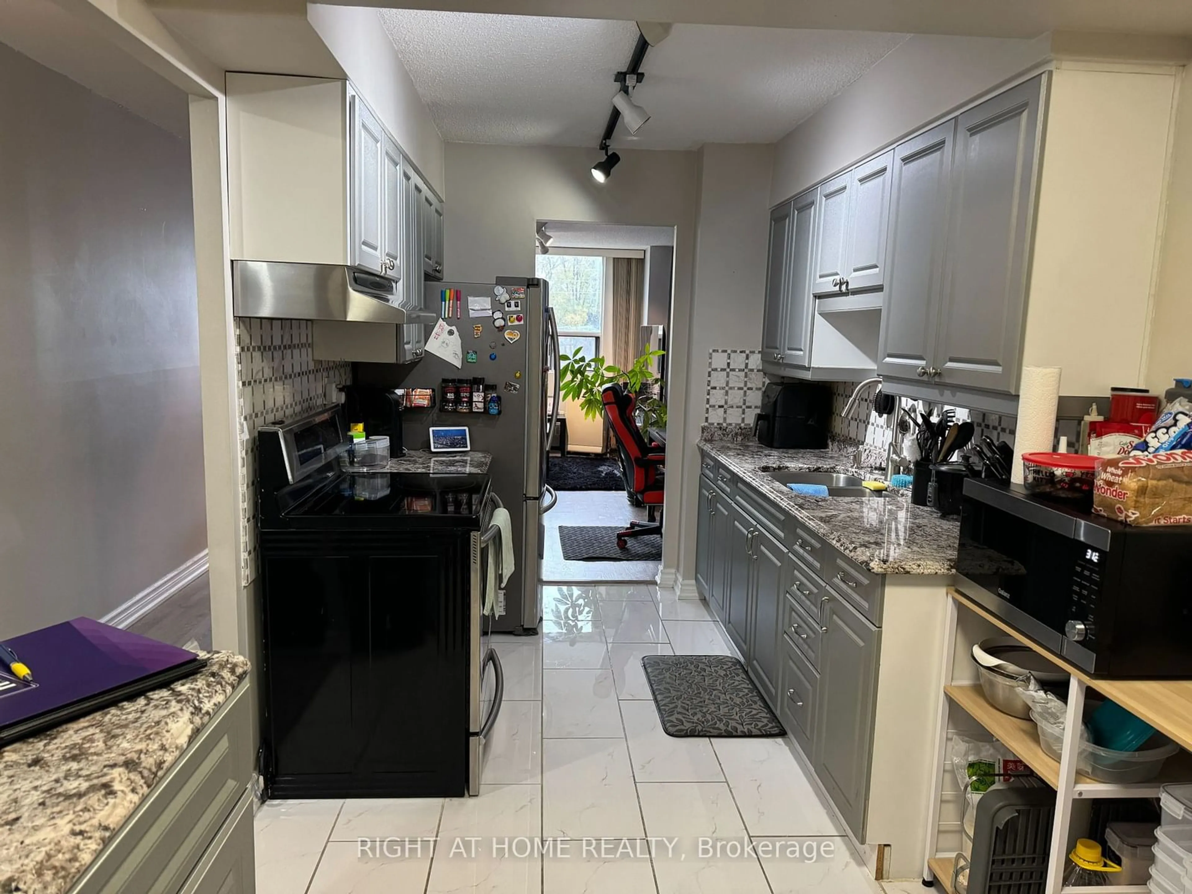 Kitchen, ceramic floors, cottage for 45 Sunrise Ave #214, Toronto Ontario M4A 2S3