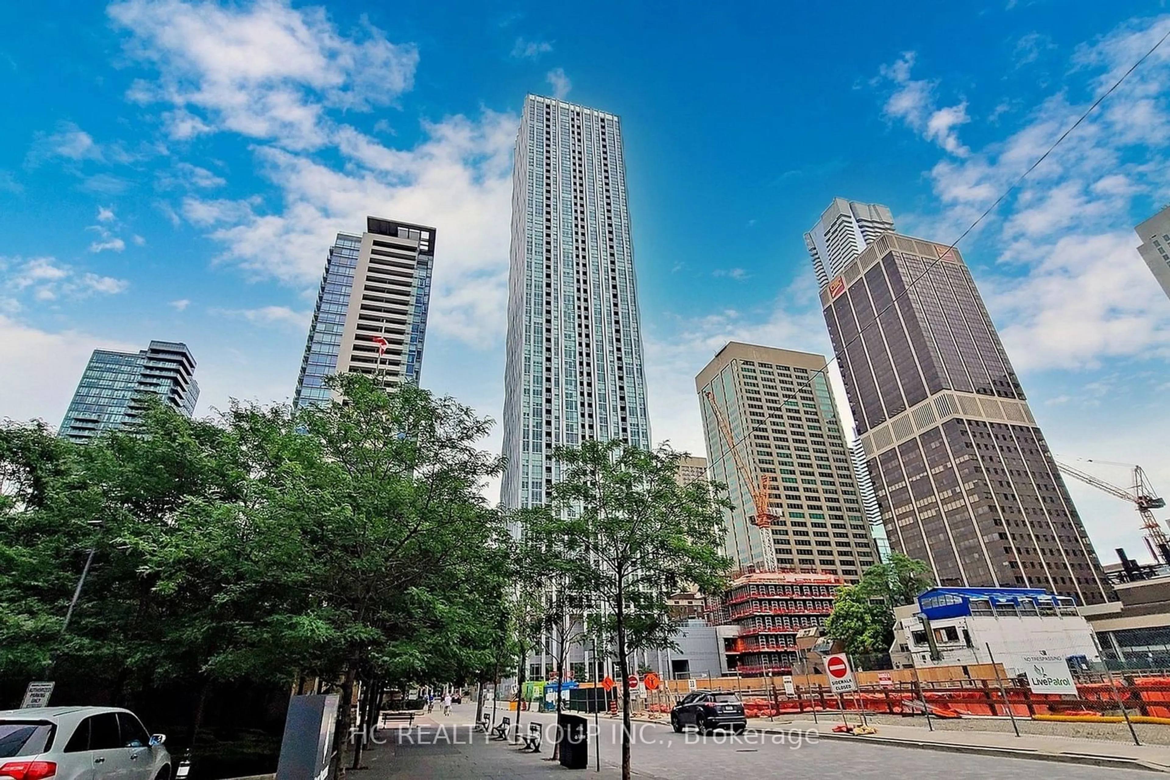 A pic from exterior of the house or condo, the view of city buildings for 1 Yorkville Ave #2902, Toronto Ontario M4W 0B1