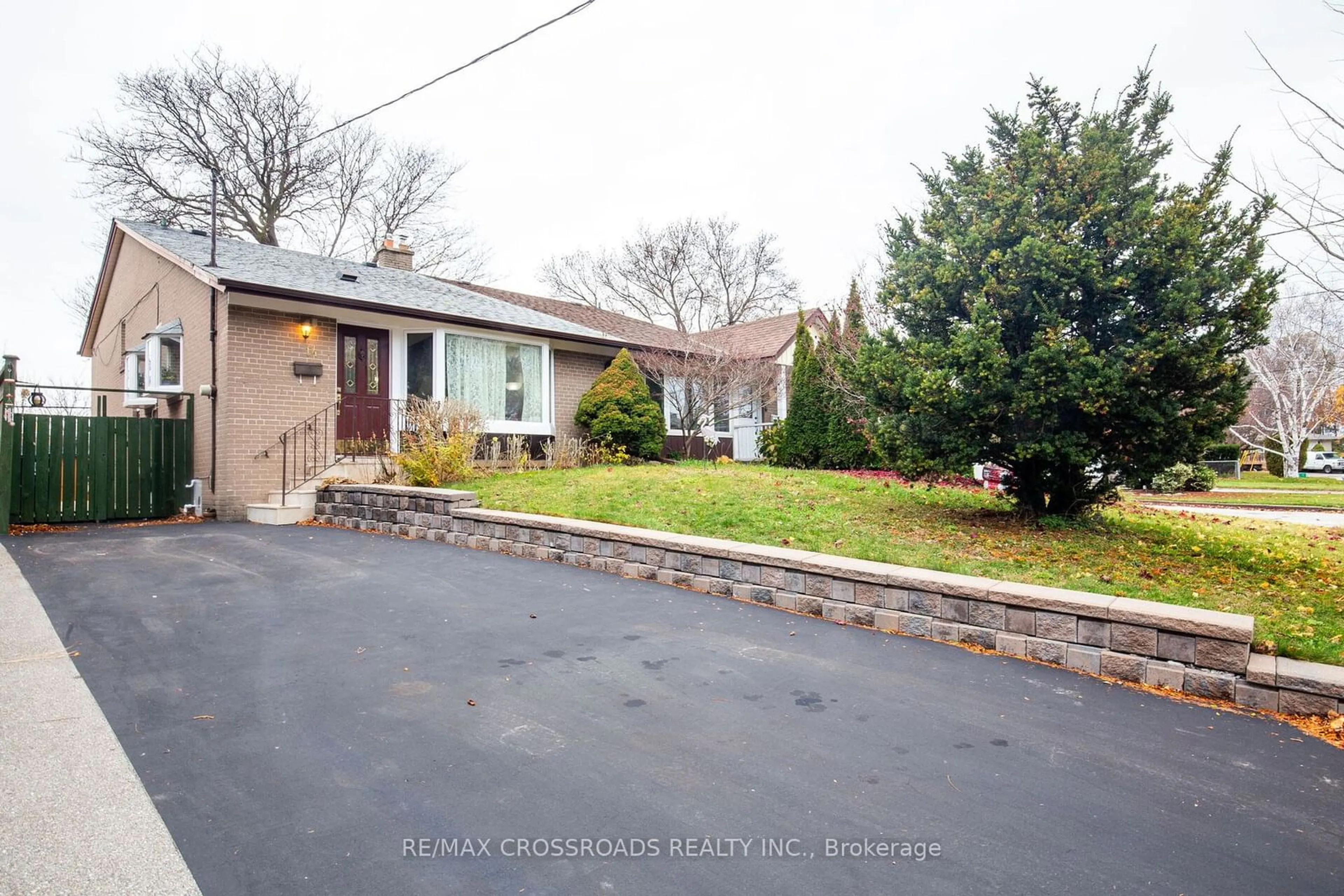 Frontside or backside of a home, the street view for 14 Baltray Cres, Toronto Ontario M3A 2H4