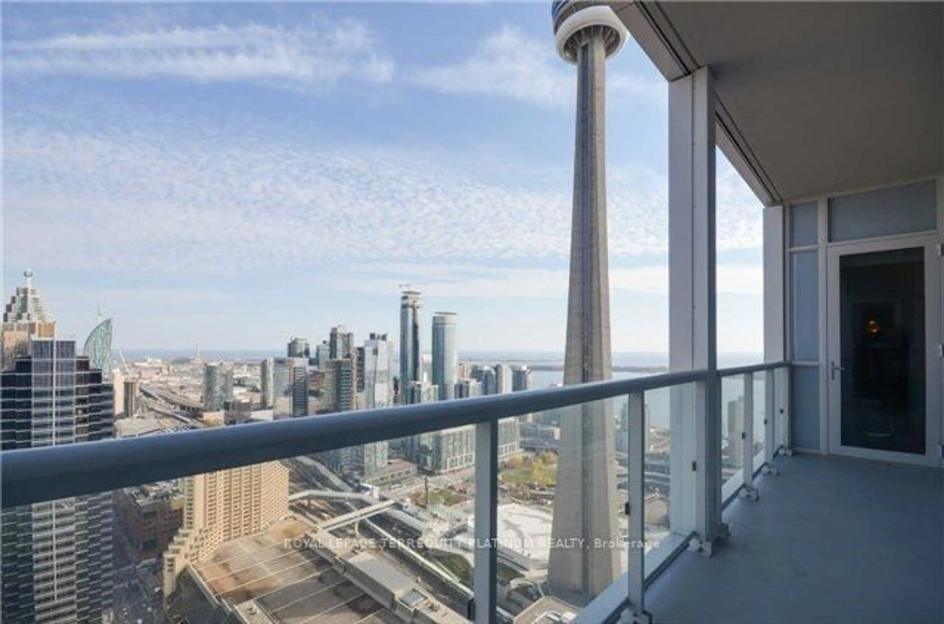 Balcony in the apartment, the view of city buildings for 300 Front St #4802, Toronto Ontario M5V 0E9