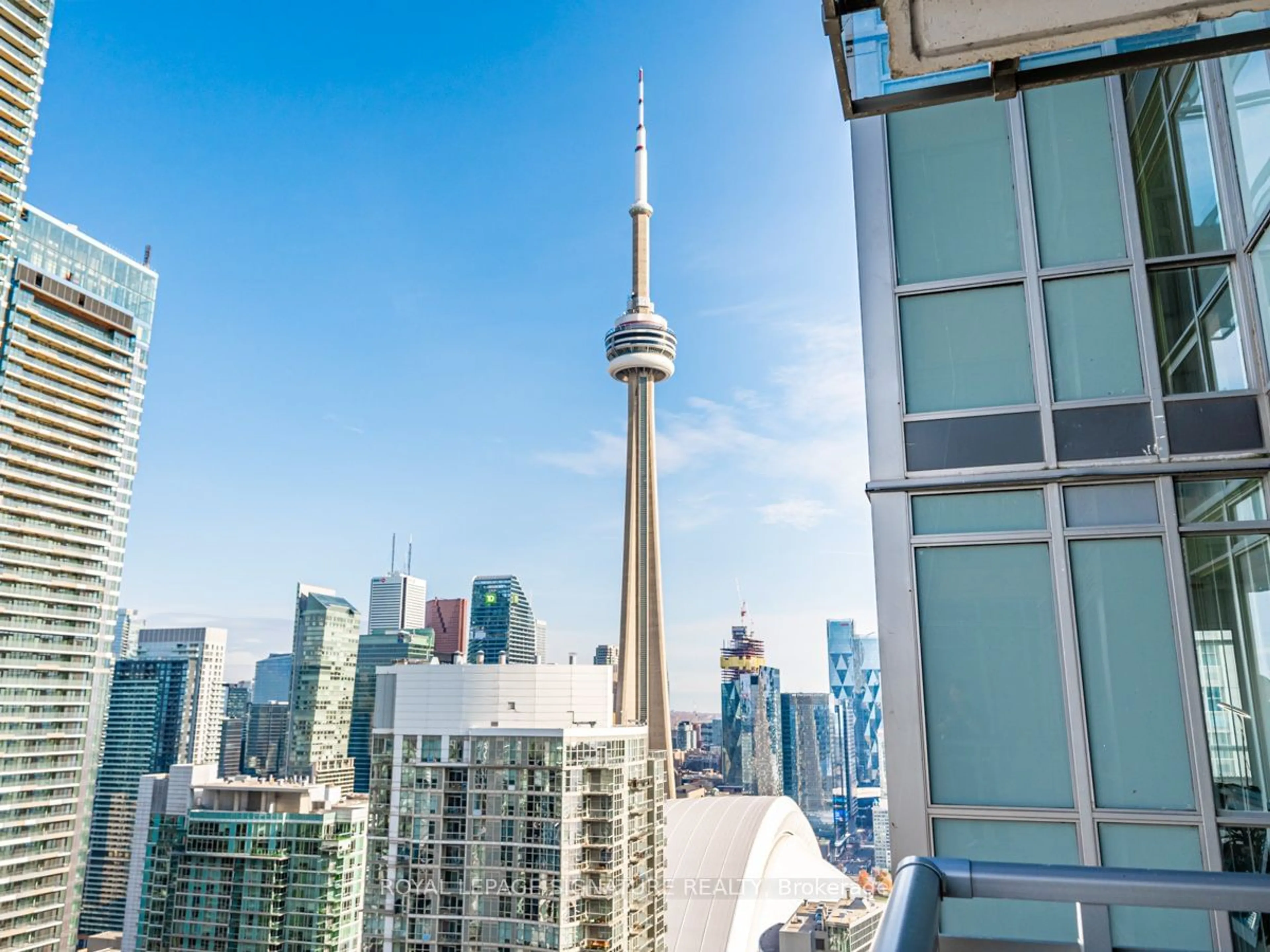 A pic from exterior of the house or condo, the view of city buildings for 11 Brunel Crt #5005, Toronto Ontario M5V 3Y3