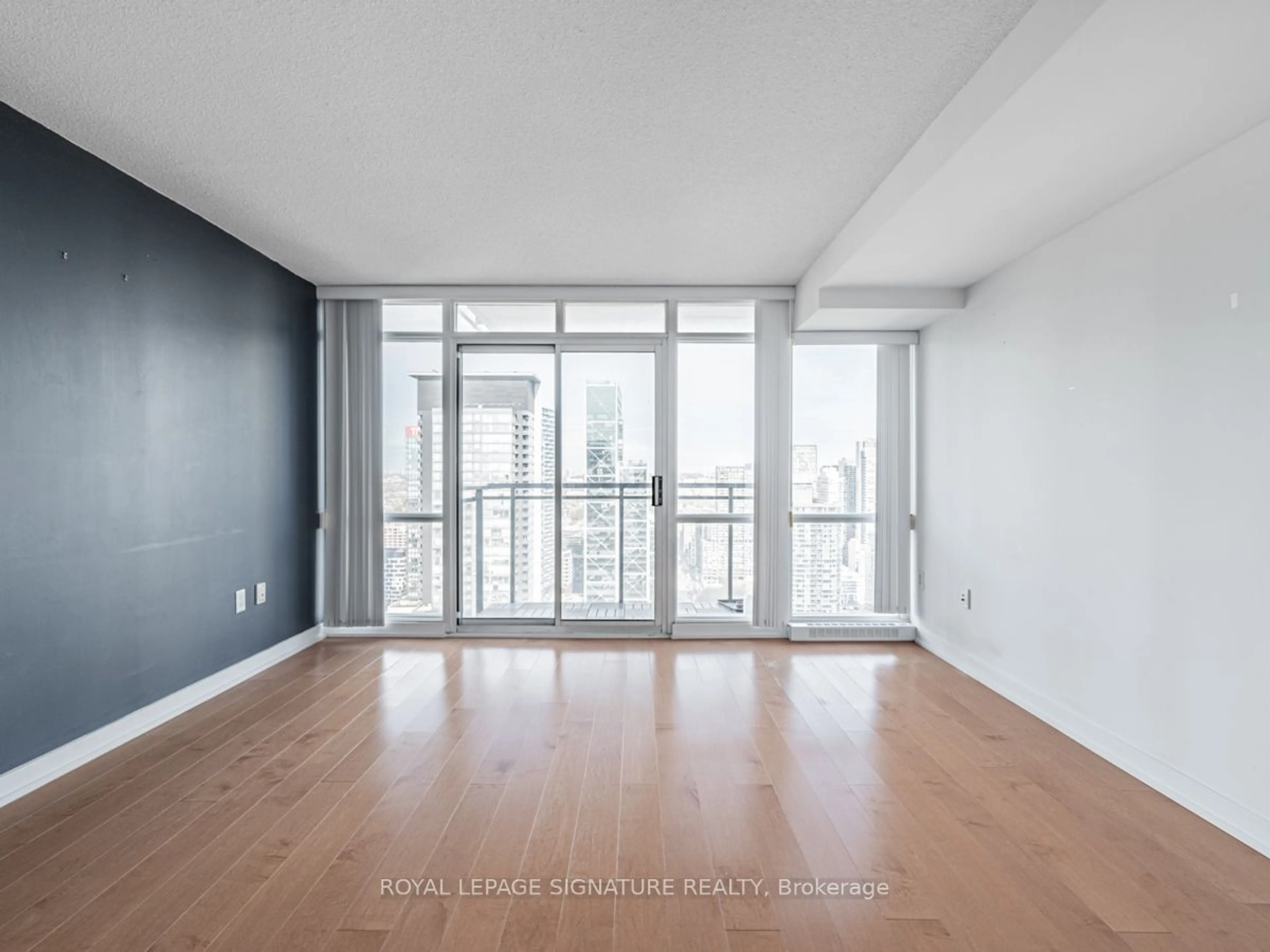 A pic of a room, wood floors for 11 Brunel Crt #5005, Toronto Ontario M5V 3Y3