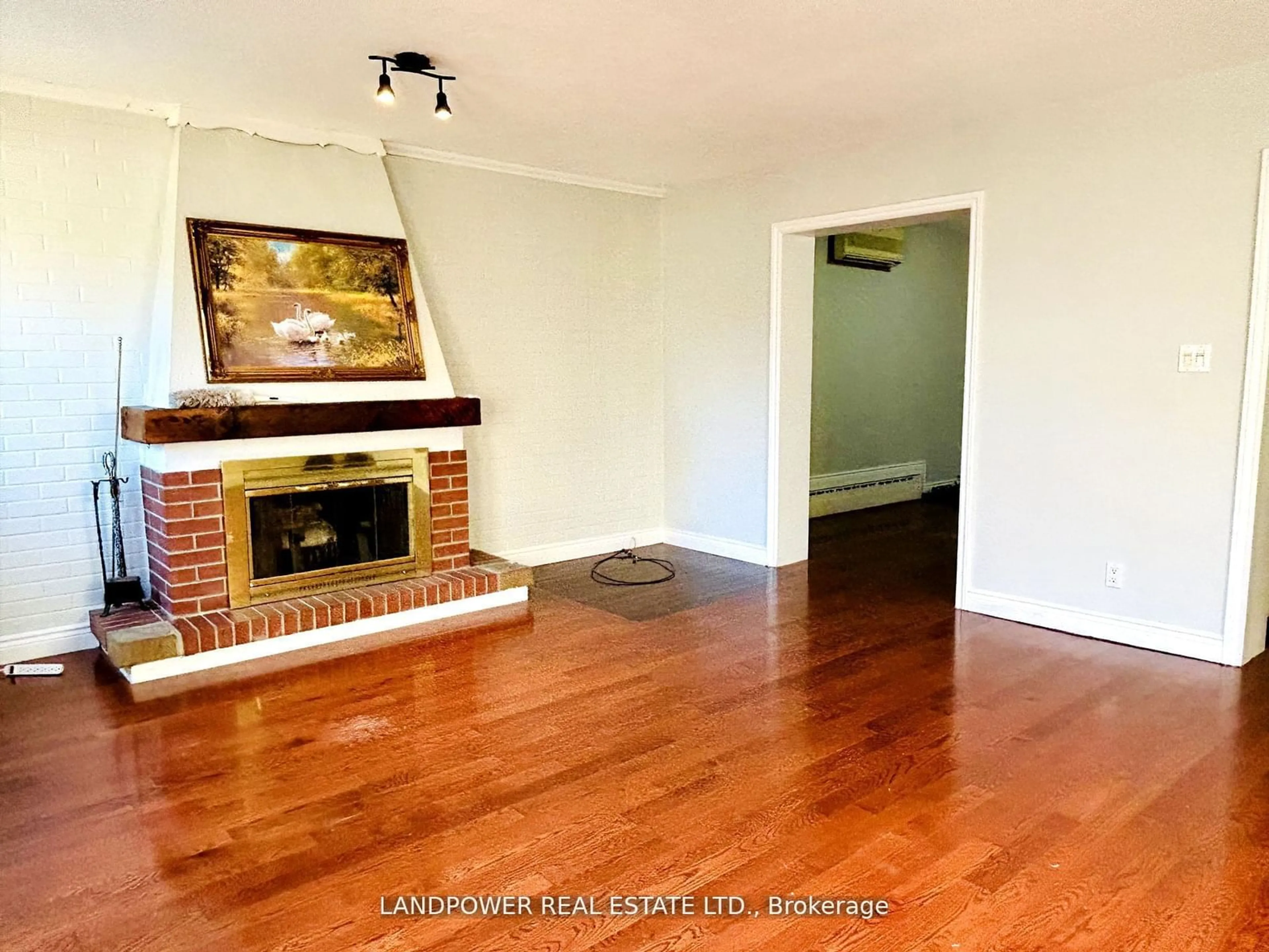 A pic of a room, wood floors for 357 Fairlawn Ave, Toronto Ontario M5M 1T5