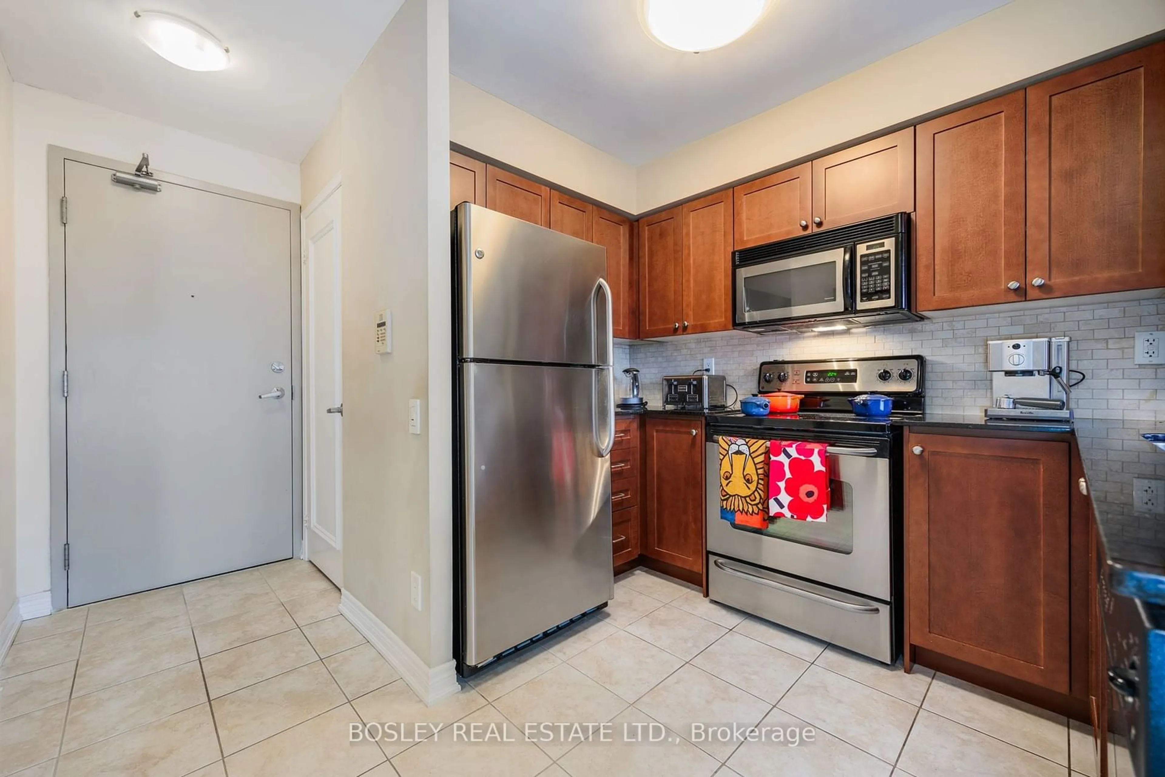 Standard kitchen, wood floors for 60 St Clair Ave #1207, Toronto Ontario M4V 1M1