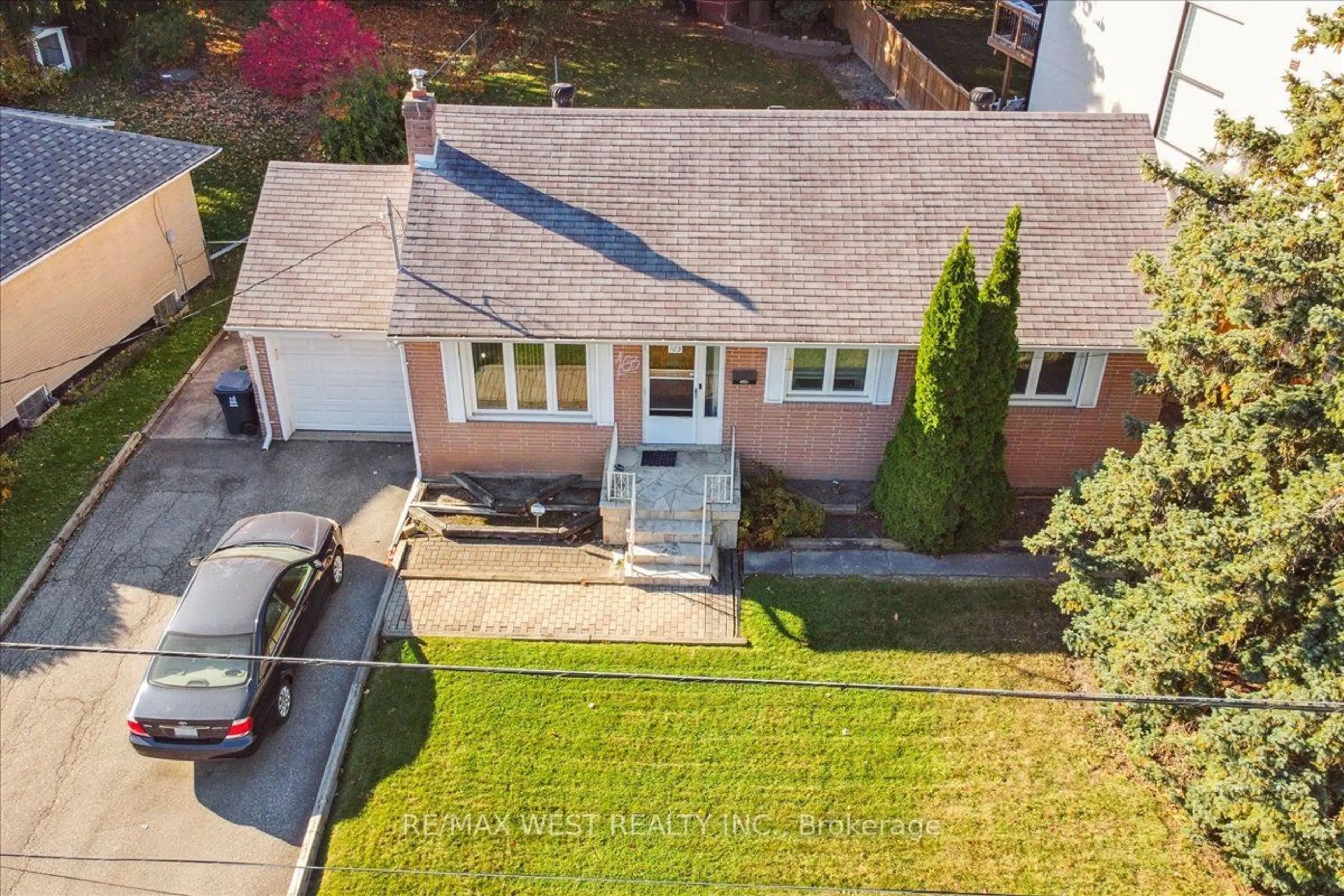 Frontside or backside of a home, the fenced backyard for 163 Newton Dr, Toronto Ontario M2M 2N6