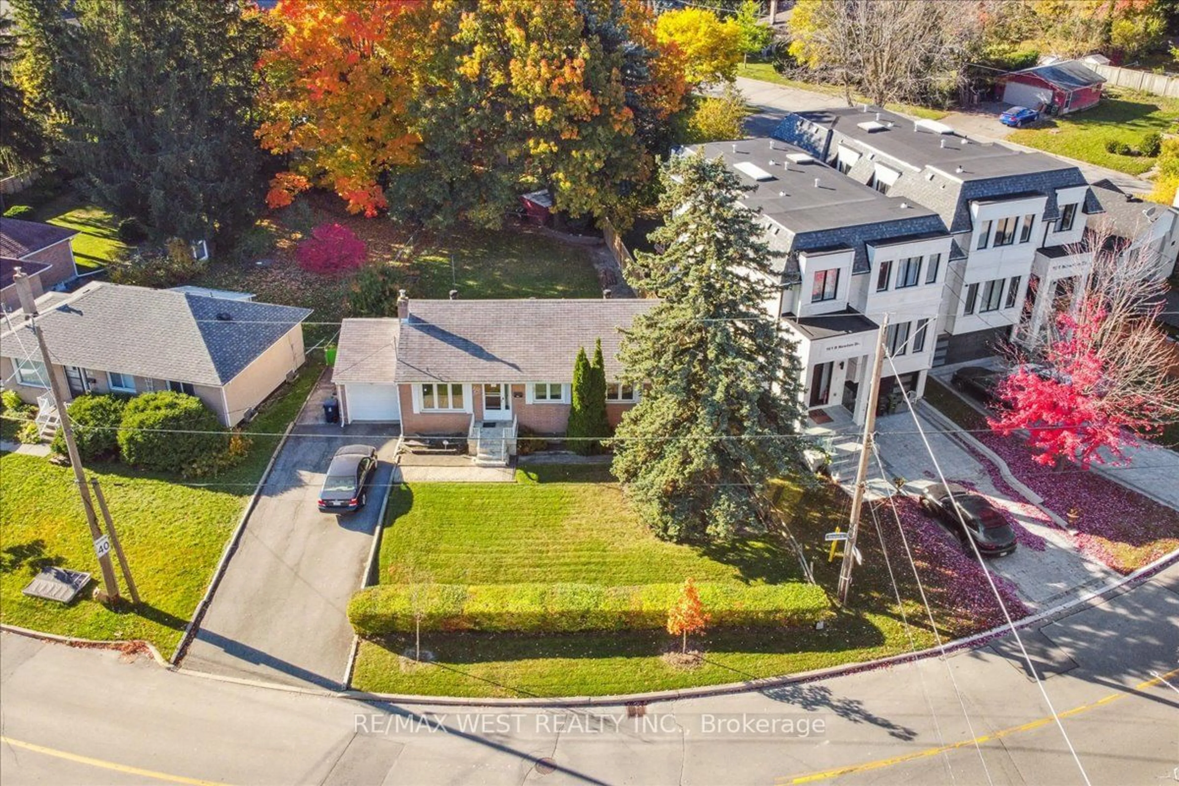 A pic from exterior of the house or condo, the street view for 163 Newton Dr, Toronto Ontario M2M 2N6