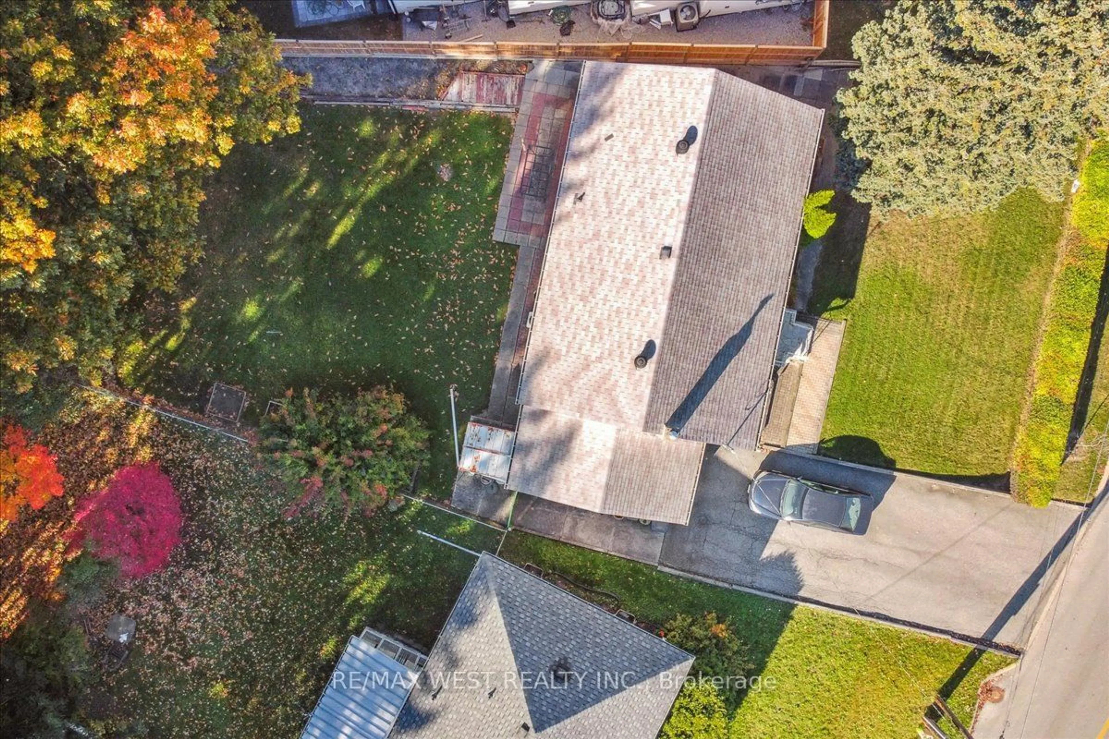 Frontside or backside of a home, the fenced backyard for 163 Newton Dr, Toronto Ontario M2M 2N6