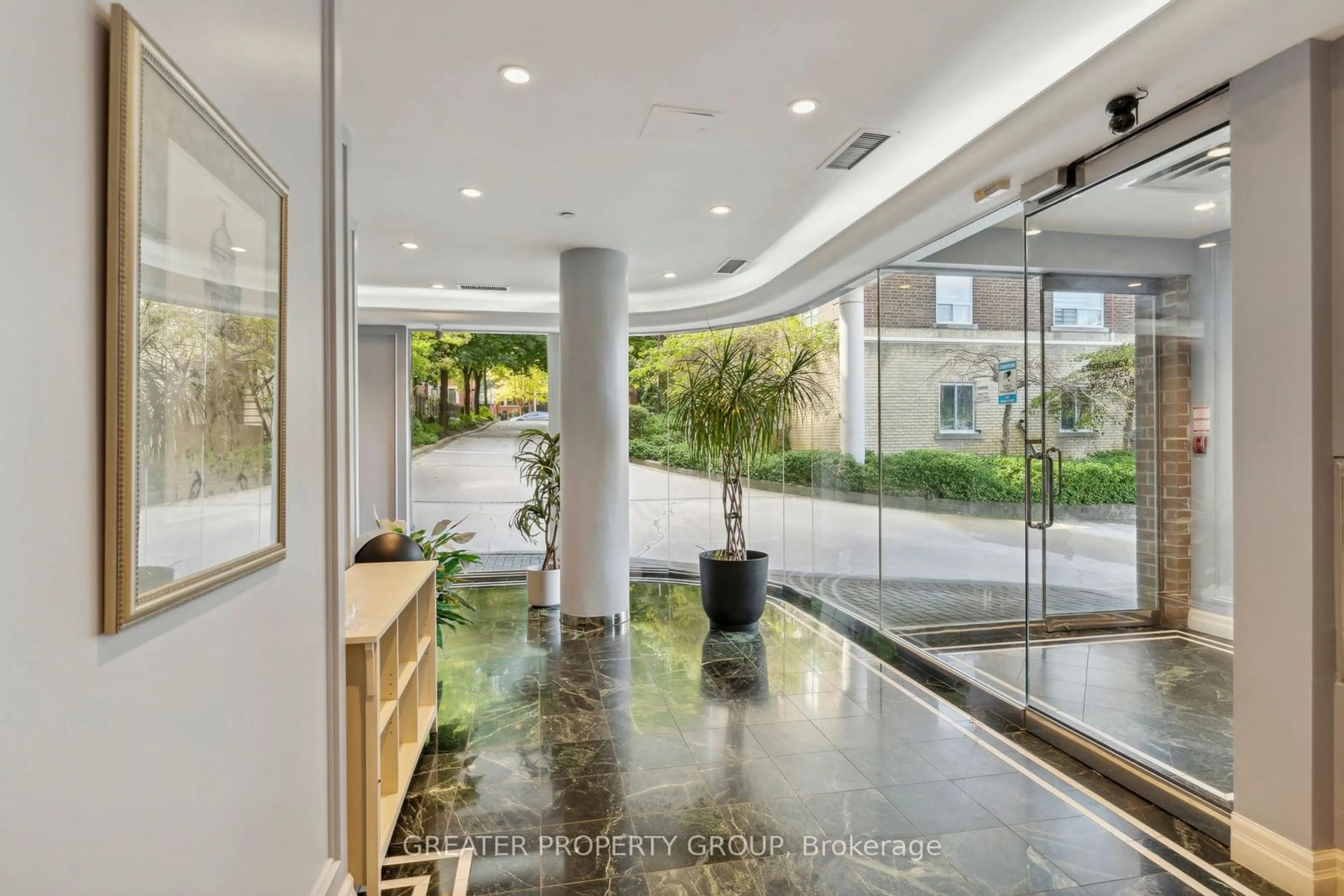 Indoor lobby, cement floor for 97 Lawton Blvd #704, Toronto Ontario M4V 1Z6