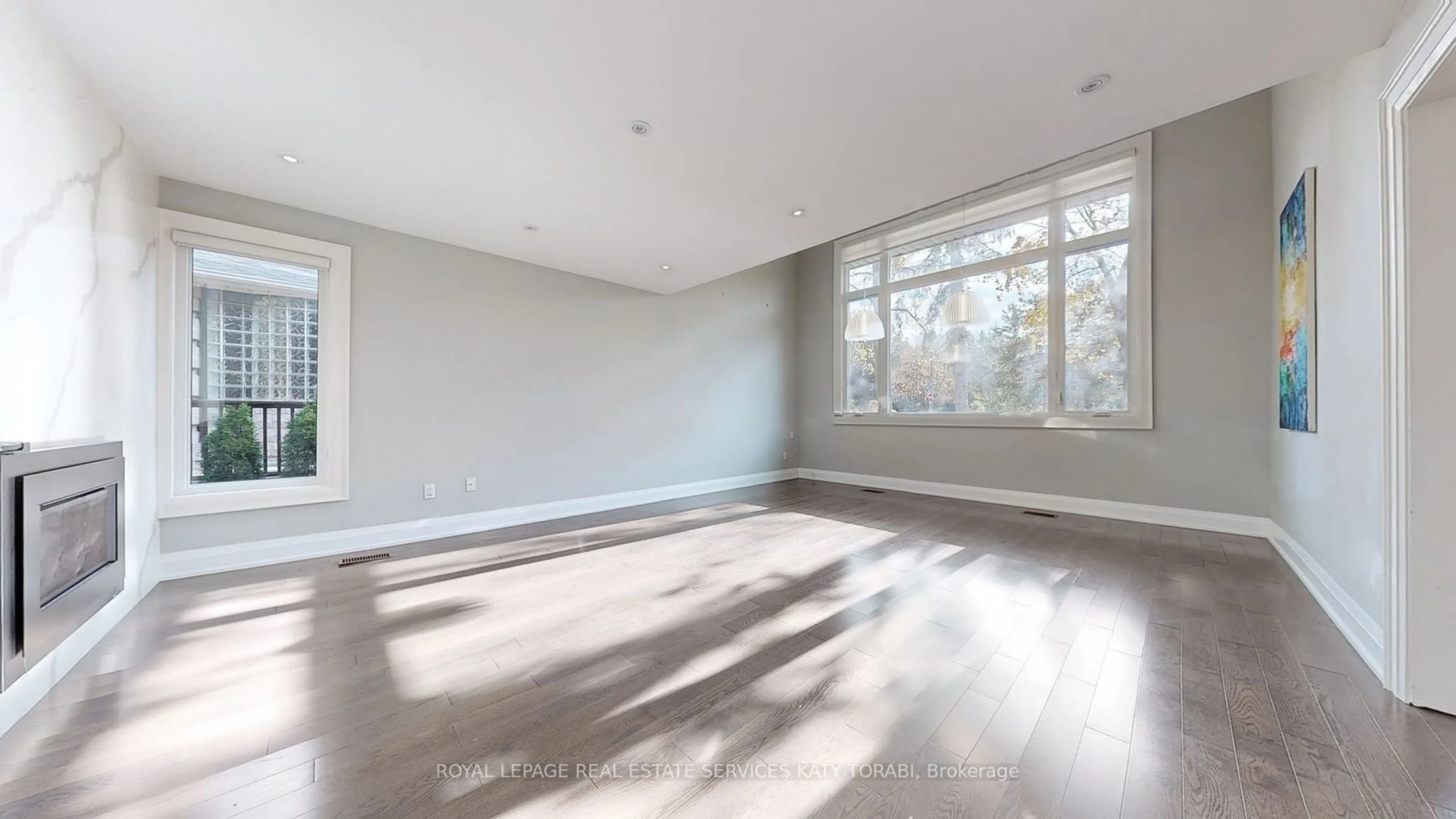 A pic of a room, wood floors for 136 Denlow Blvd, Toronto Ontario M3B 3J2