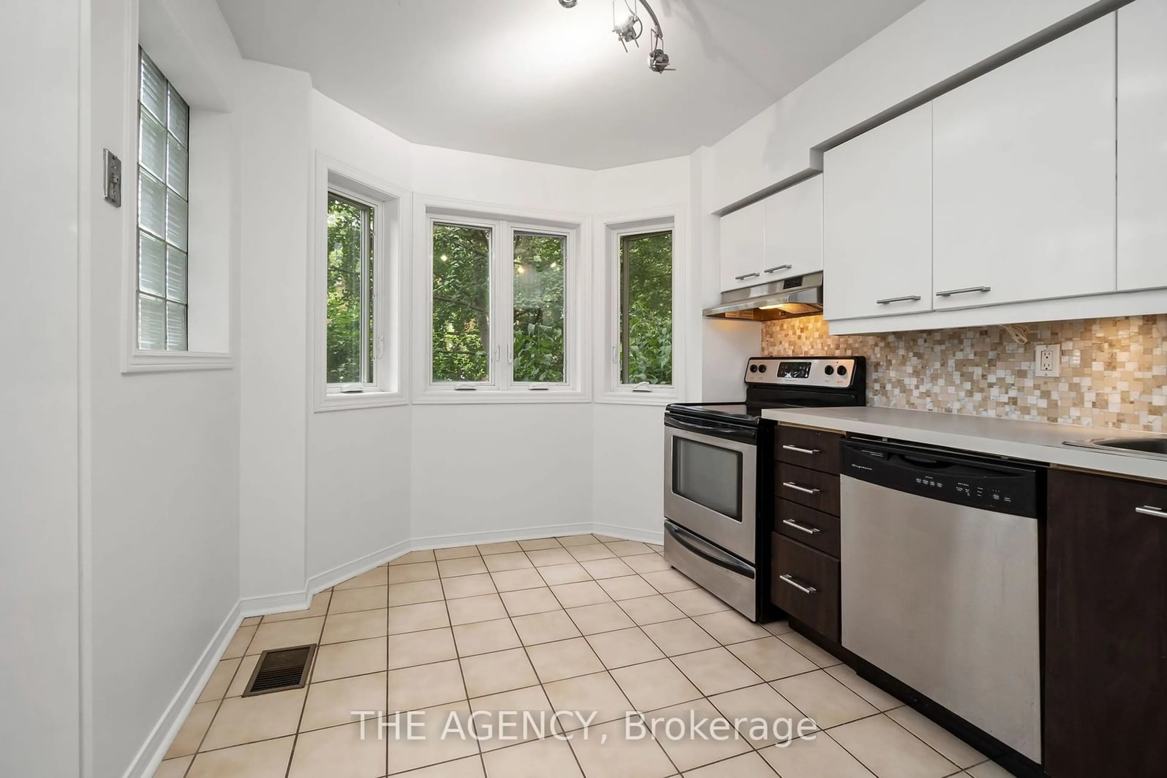 Standard kitchen, wood floors, the street view for 4A Shank St, Toronto Ontario M6J 3T8